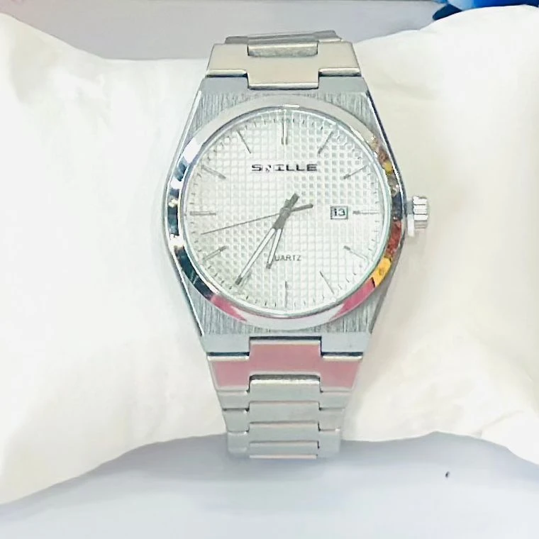 analog watch with a white dial and date function.