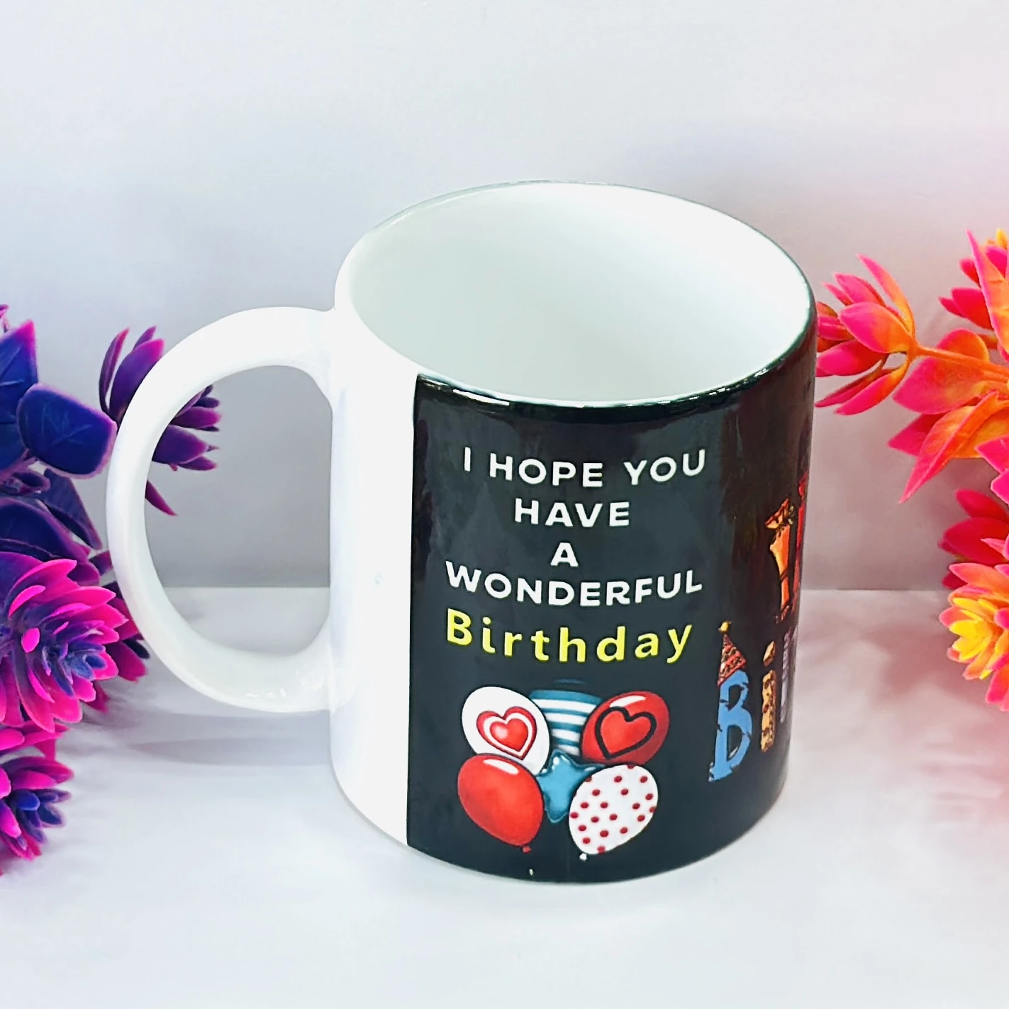 ceramic coffee mug with a "Happy Birthday" print. ….S7EG1P