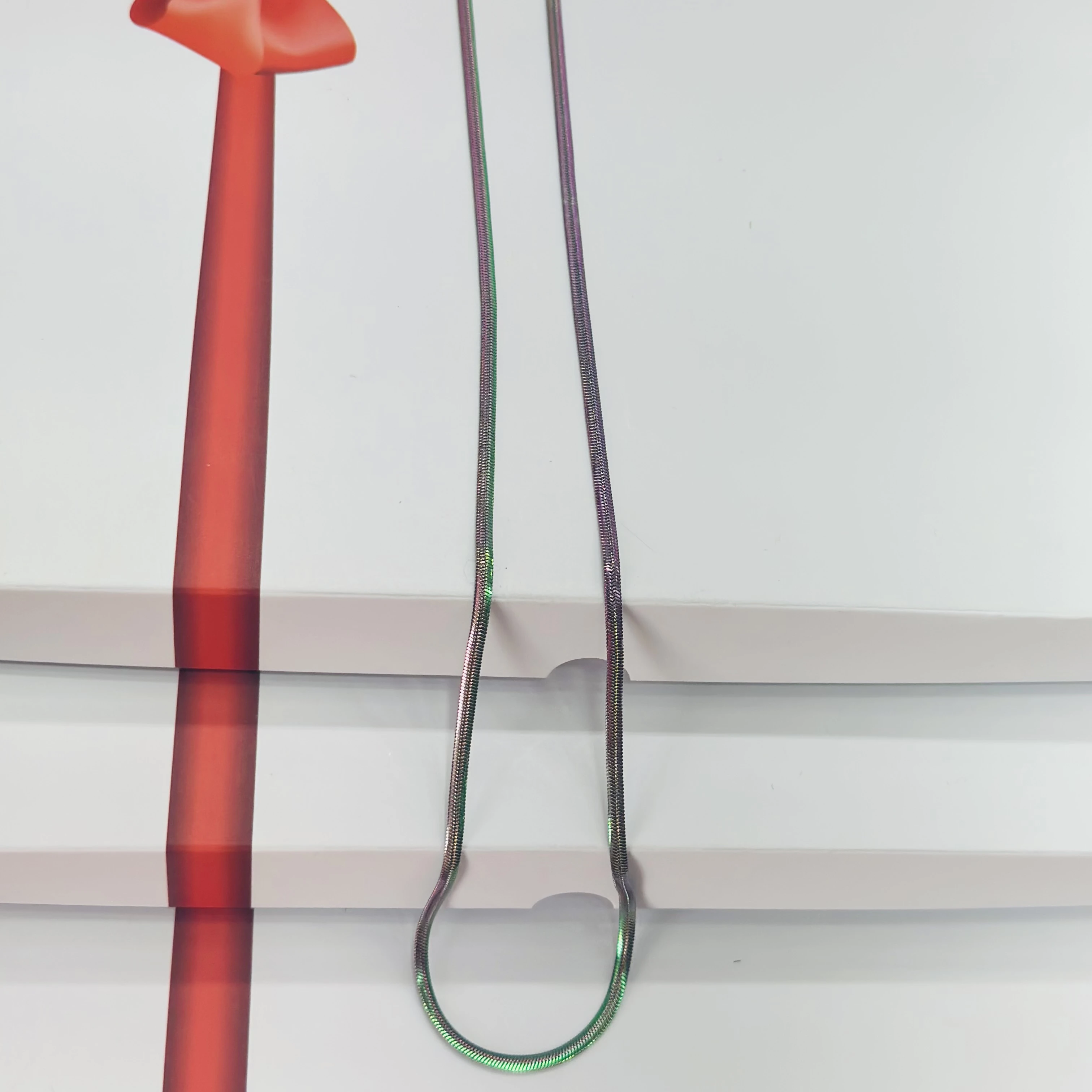 stainless steel multicolor shade link chain.