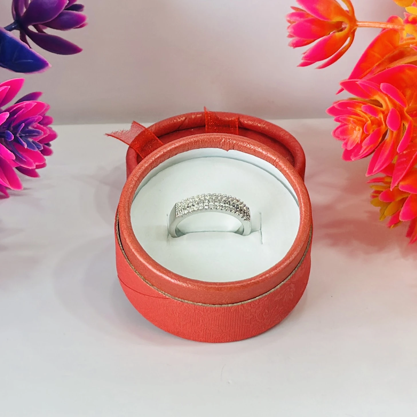 Silver multi-row American diamond band ring.