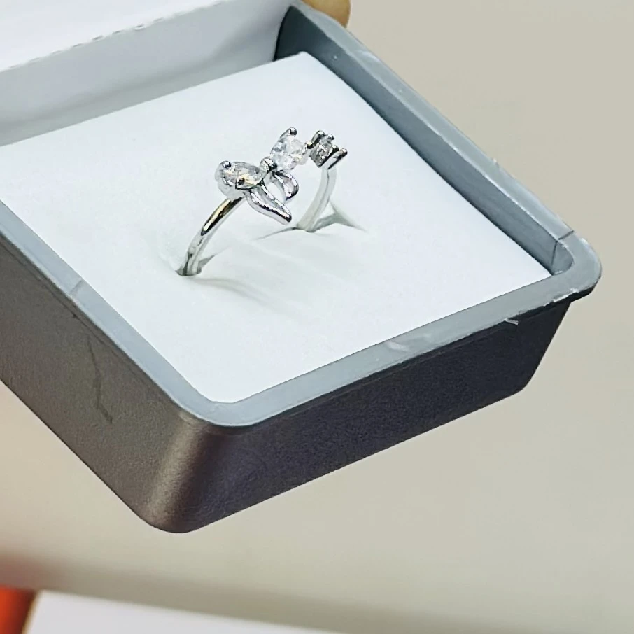 sterling silver floral ring with zircon stones.
