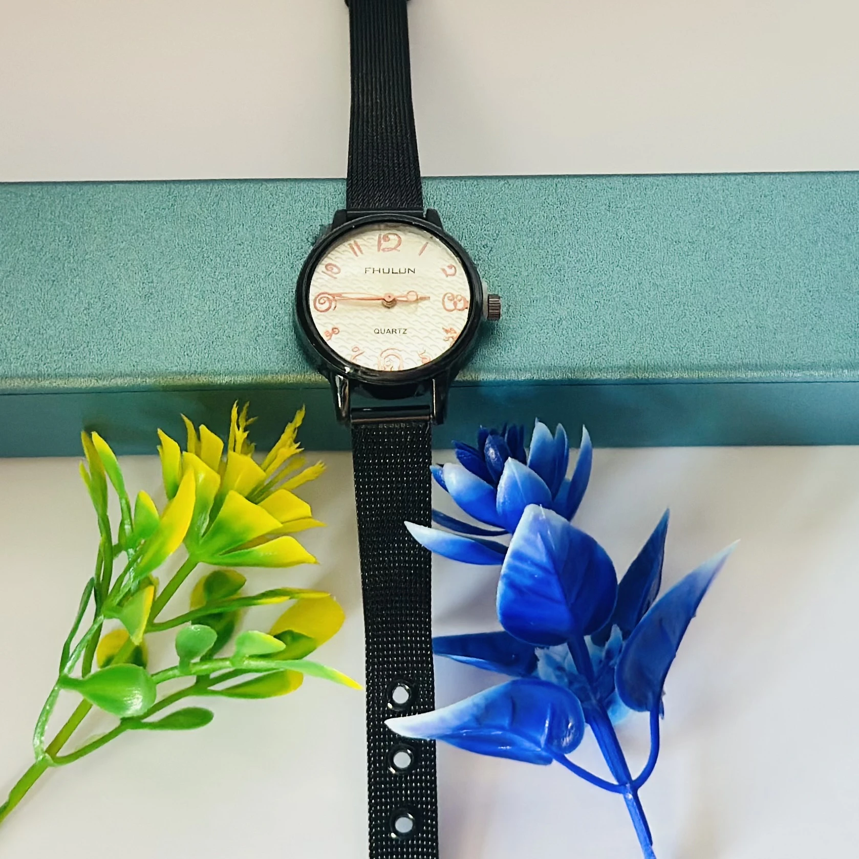 Quartz analog watch for women.