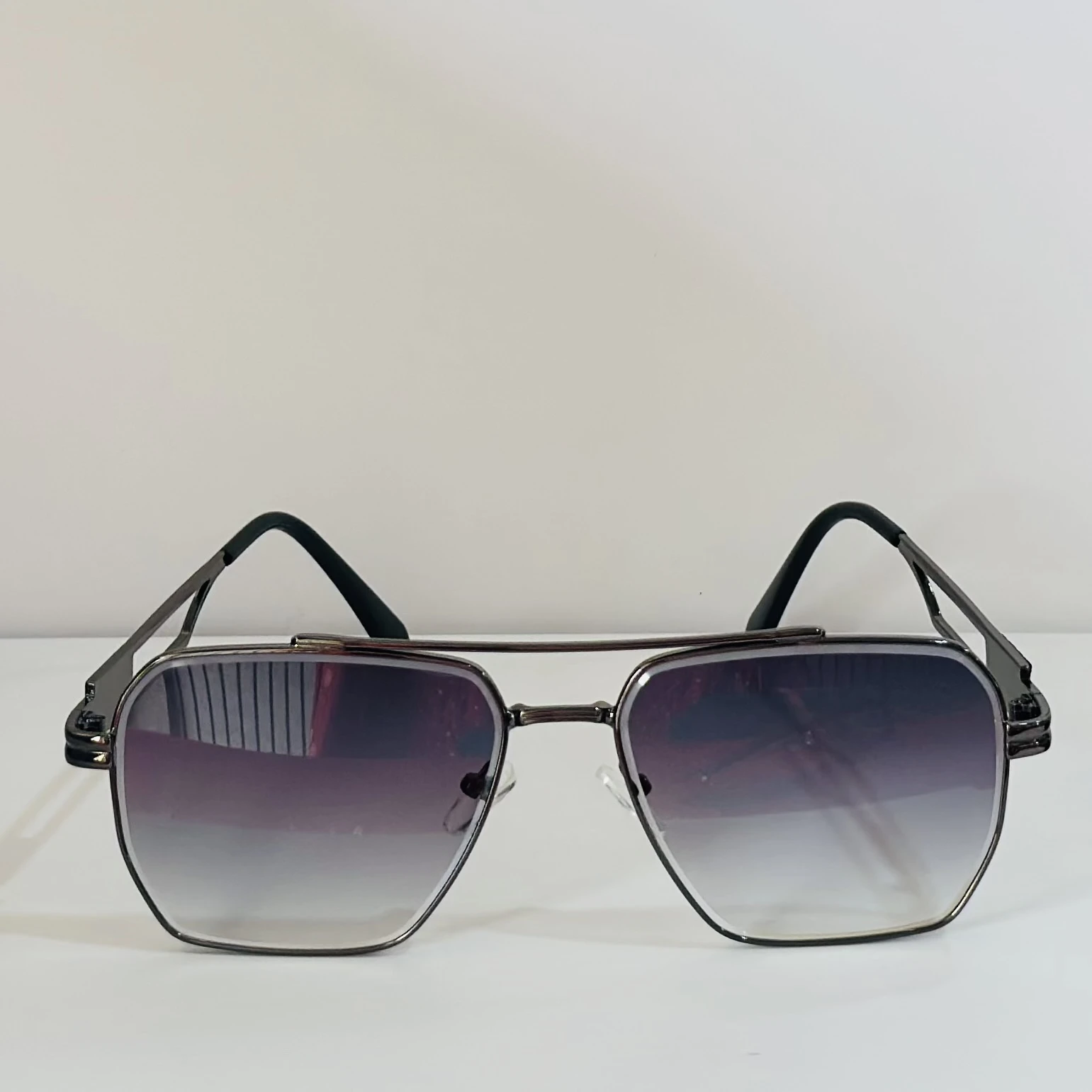 pair of Voyage unisex grey frame purple lens color wayfarer sunglasses.