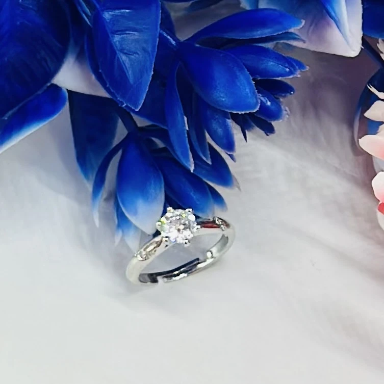 An adjustable silver-plated ring