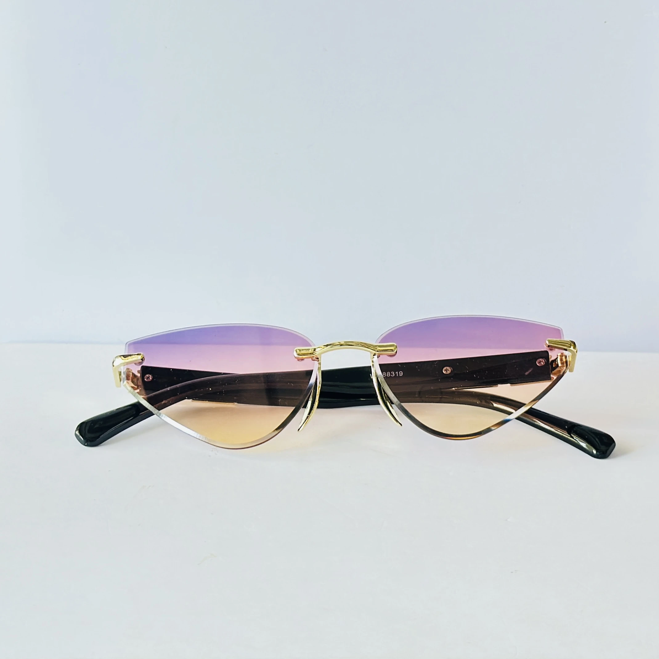 Rimless cat-eye sunglasses