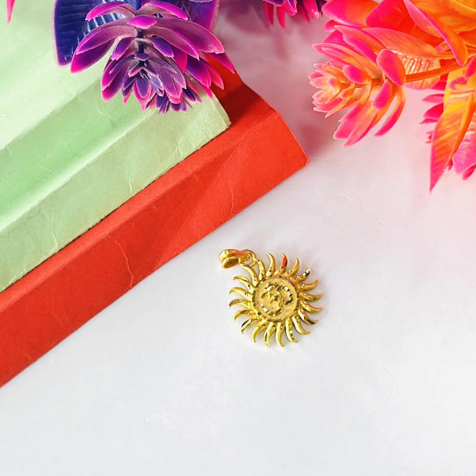 Gold plated Surya sun pendant
