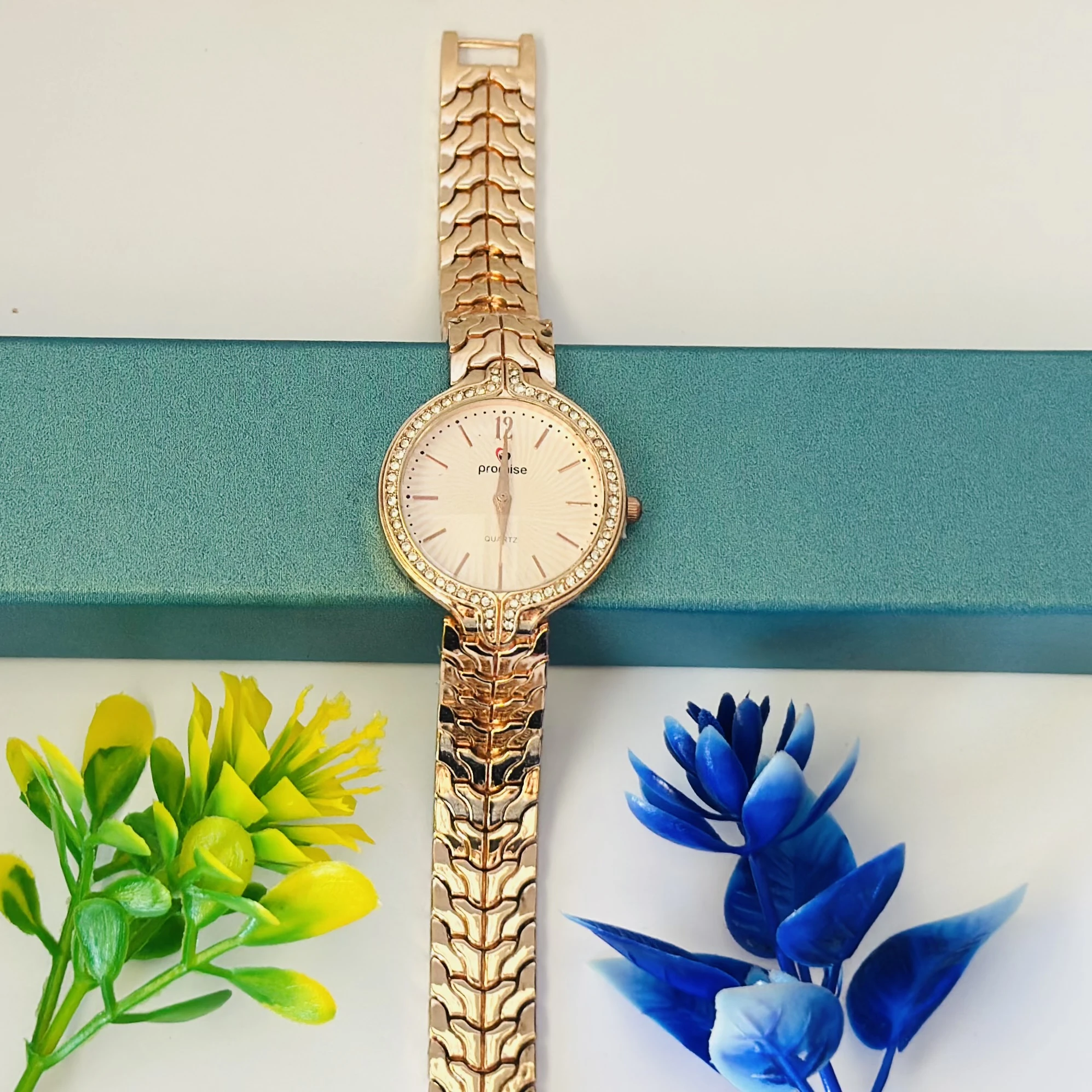 Rose gold analog women's watch.