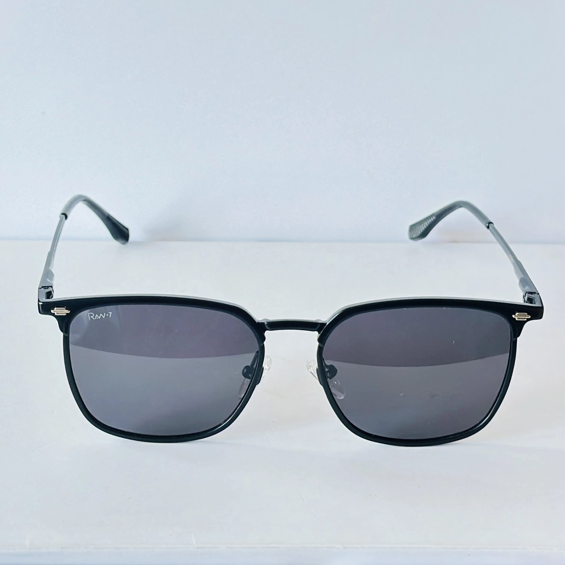 RAw-7 sunglasses feature a sleek black full-rim rectangle frame