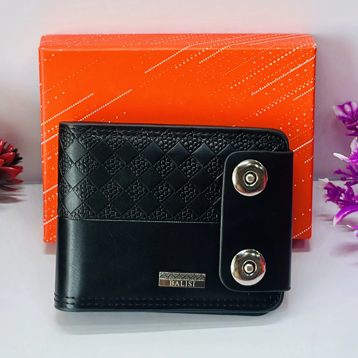 Black bi-fold men's wallet with a snap closure, branded as "Balisi".