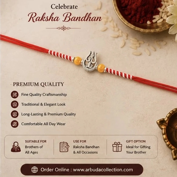 silver-plated trishul charm on a red braided thread.