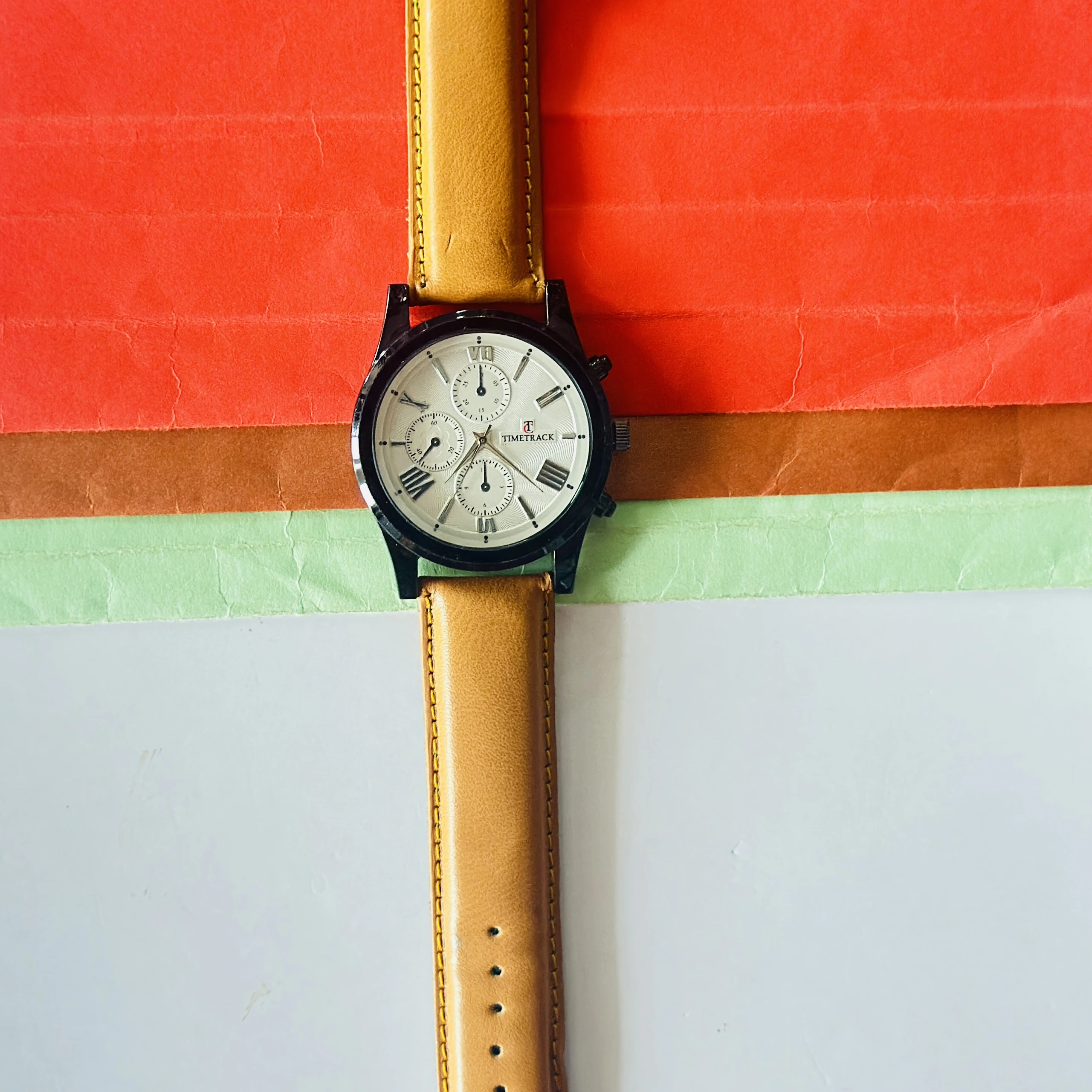 Timetrack brand analog wristwatch