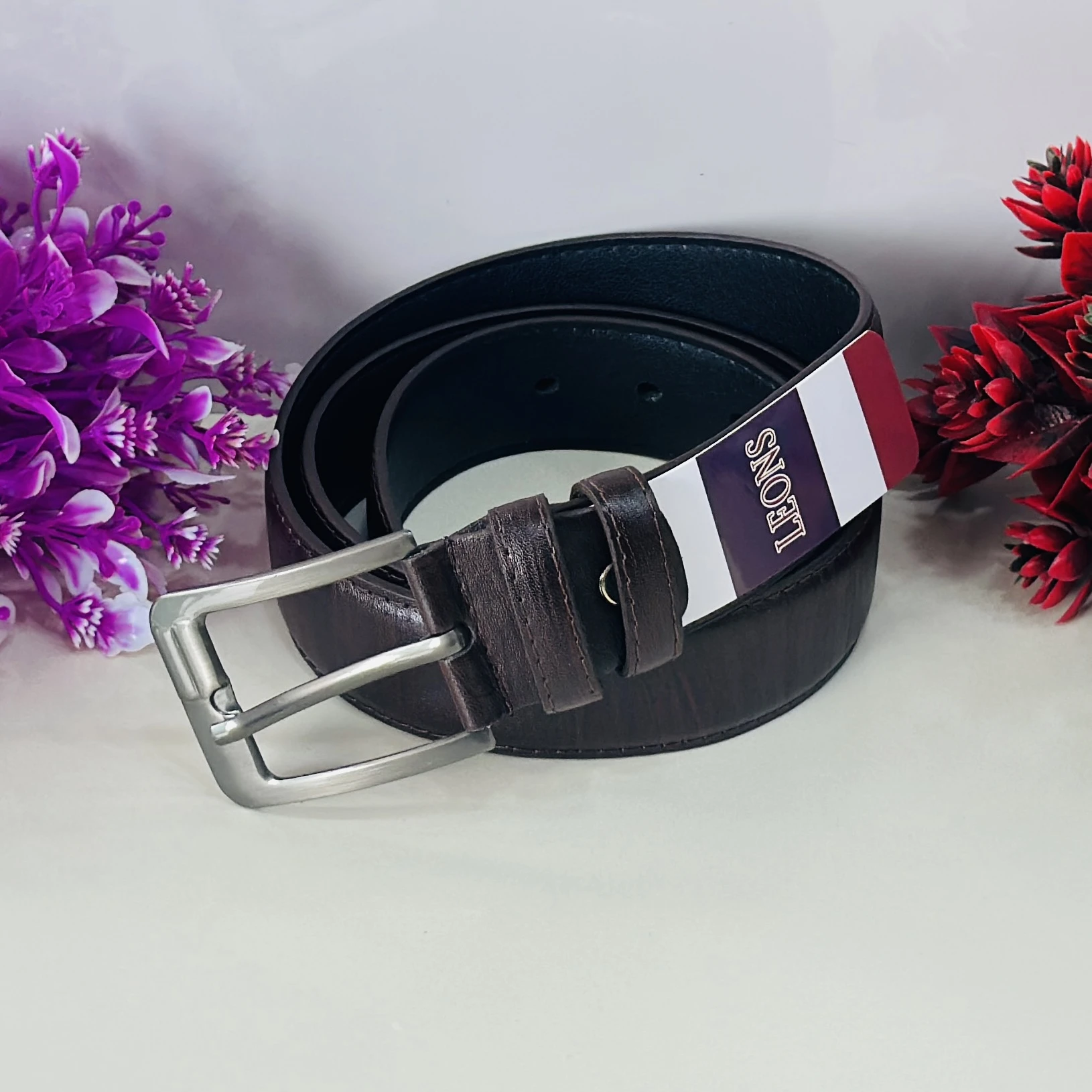 leather belt in brown and black.