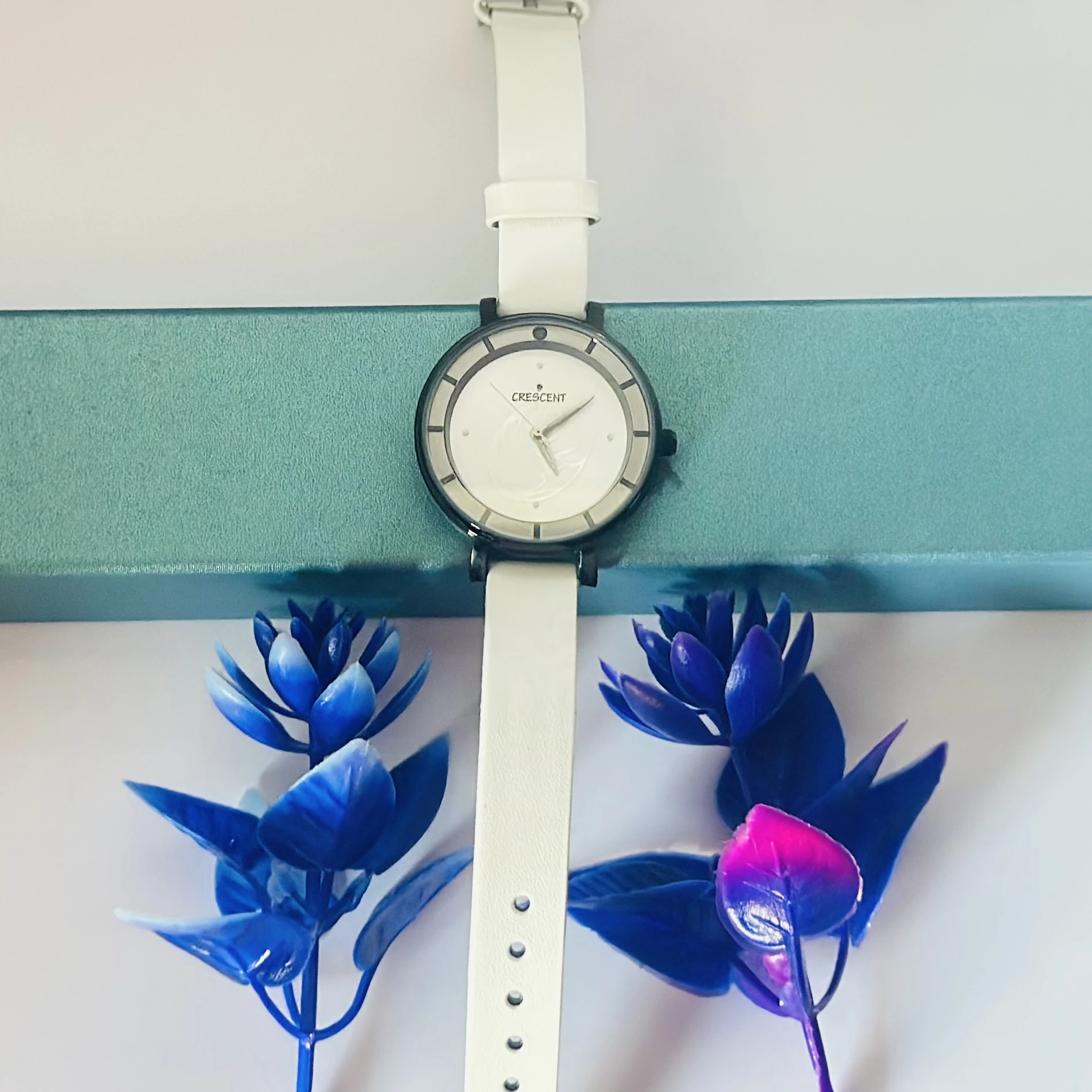 white leather strap analog watch