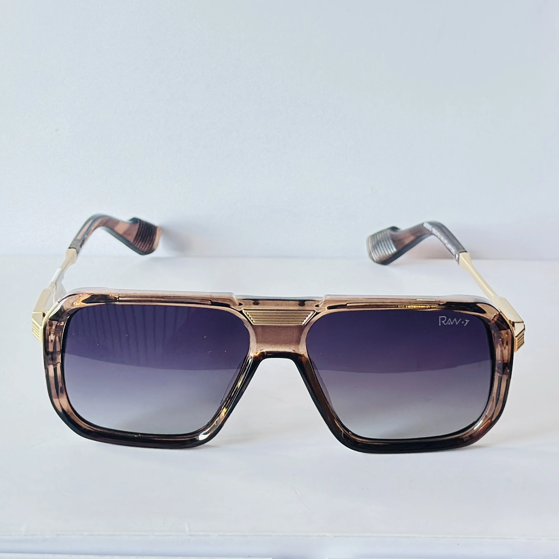 glasses are the Cazal Eyewear Model 678 sunglasses