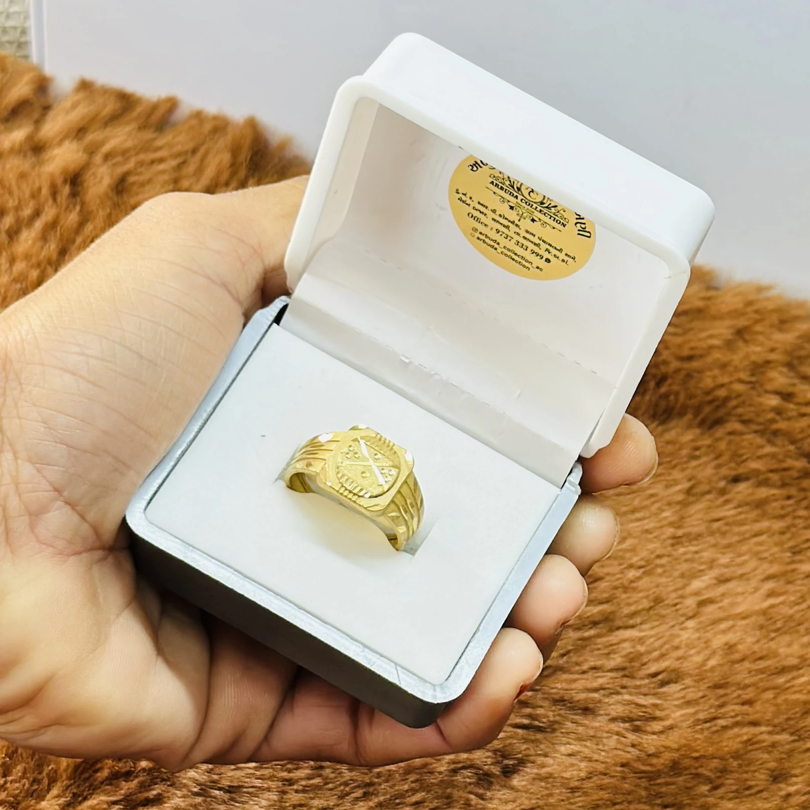 Gold plated or 22k gold men's ring with a unique watch-face design.