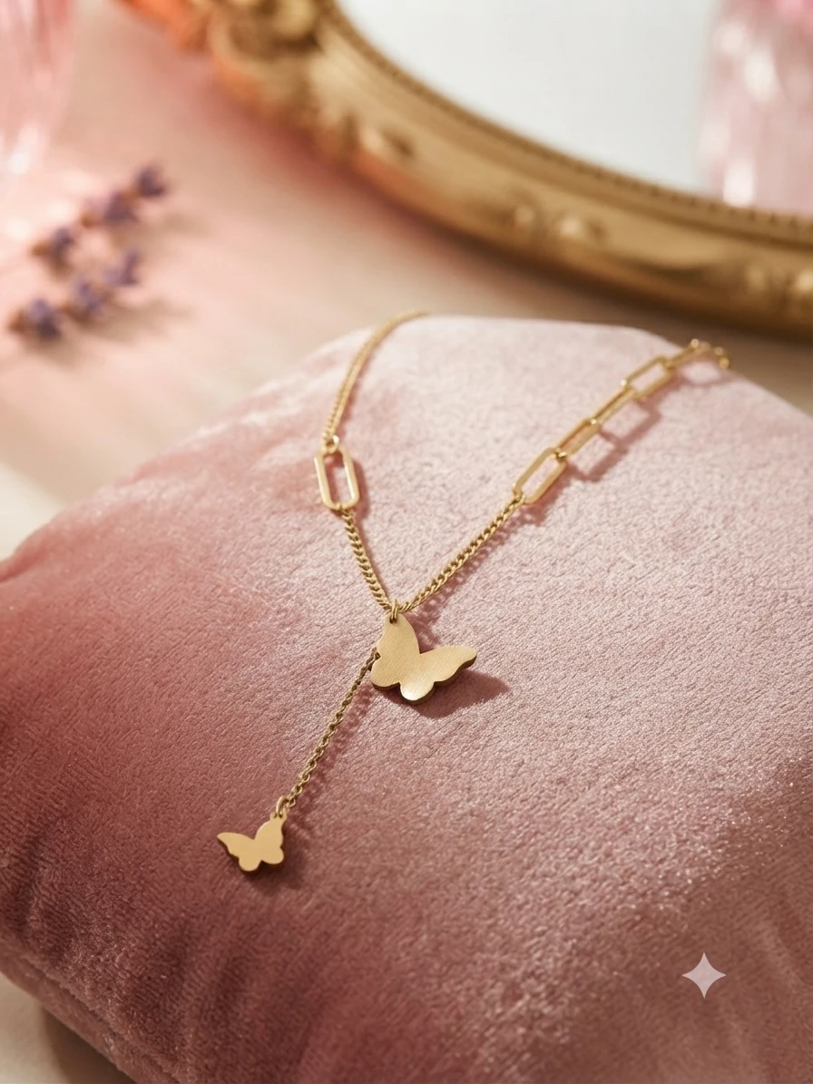 gold-plated stainless steel necklace features a delicate butterfly drop design