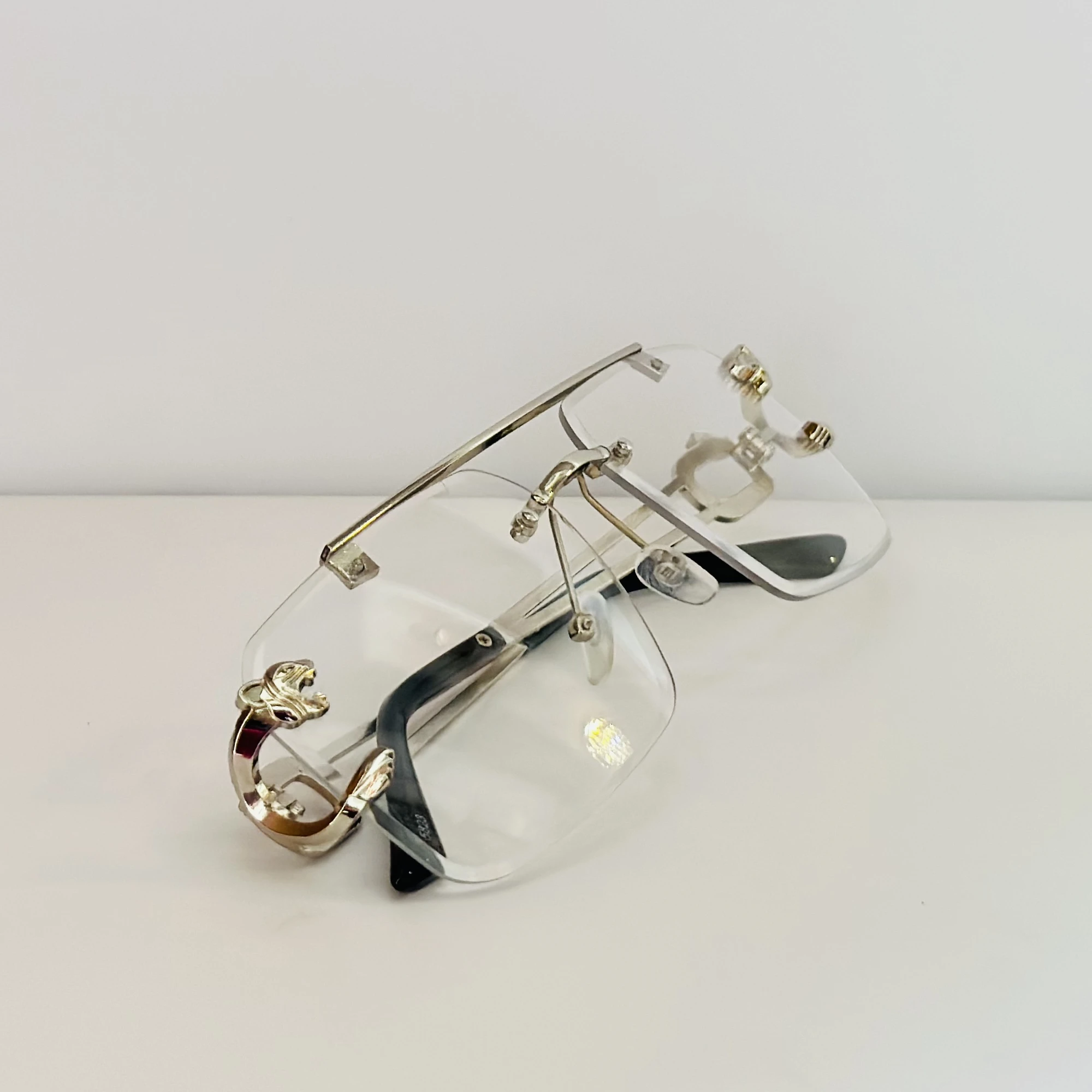 RioRabbit Mobster silver-frame rimless square eyeglasses with blue light blocking technology.