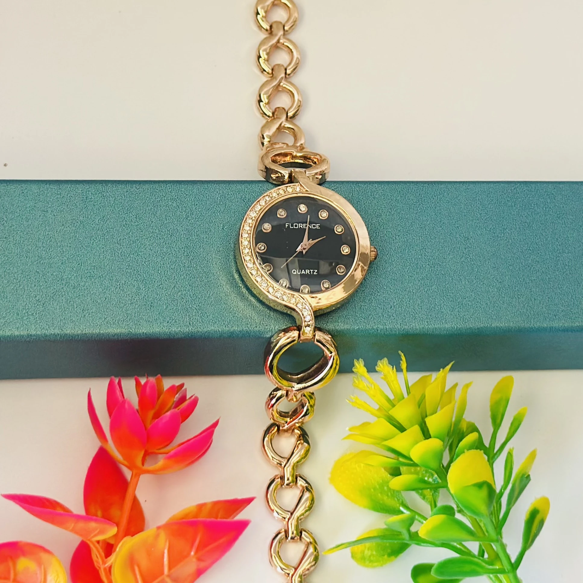 Women’s rose gold-tone quartz watch