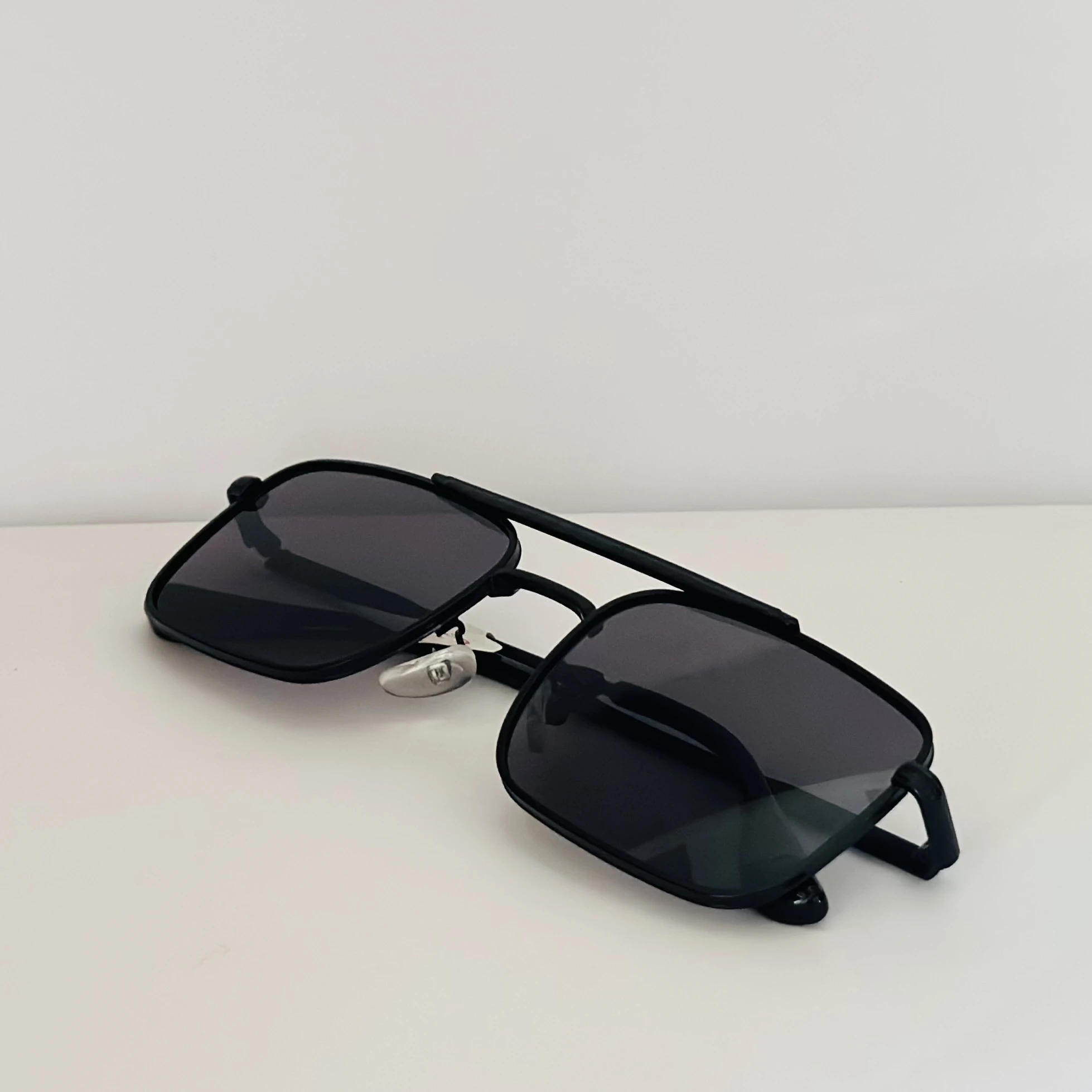 Guess GU00060 sunglasses in matte black with grey lenses.