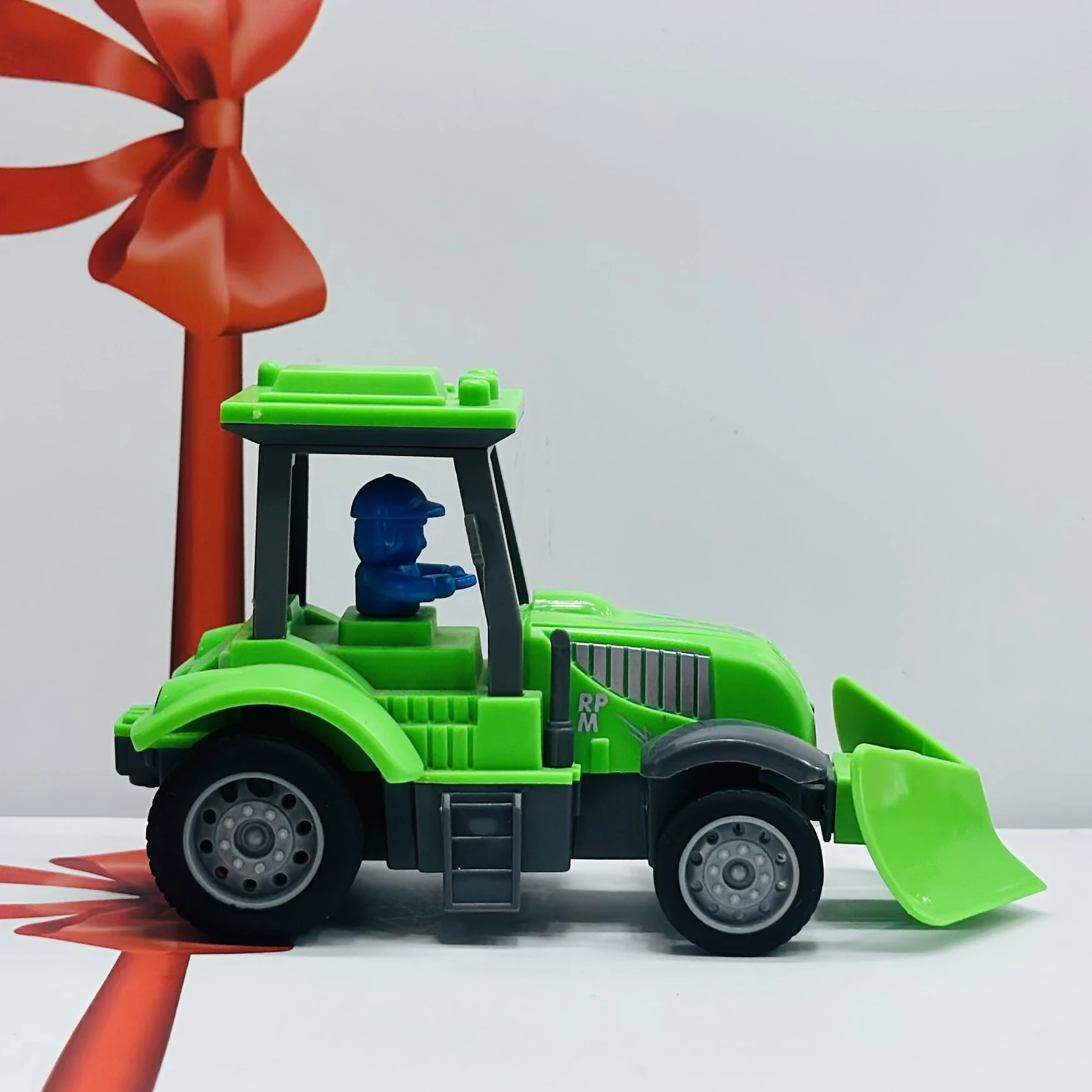 Green toy tractor