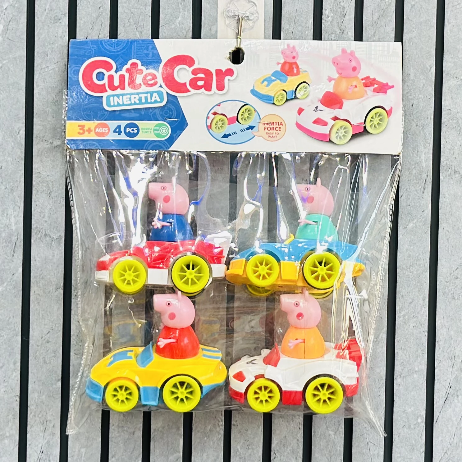 set of four "Cute Car" inertia-powered toy cars featuring characters resembling the Peppa Pig family.
