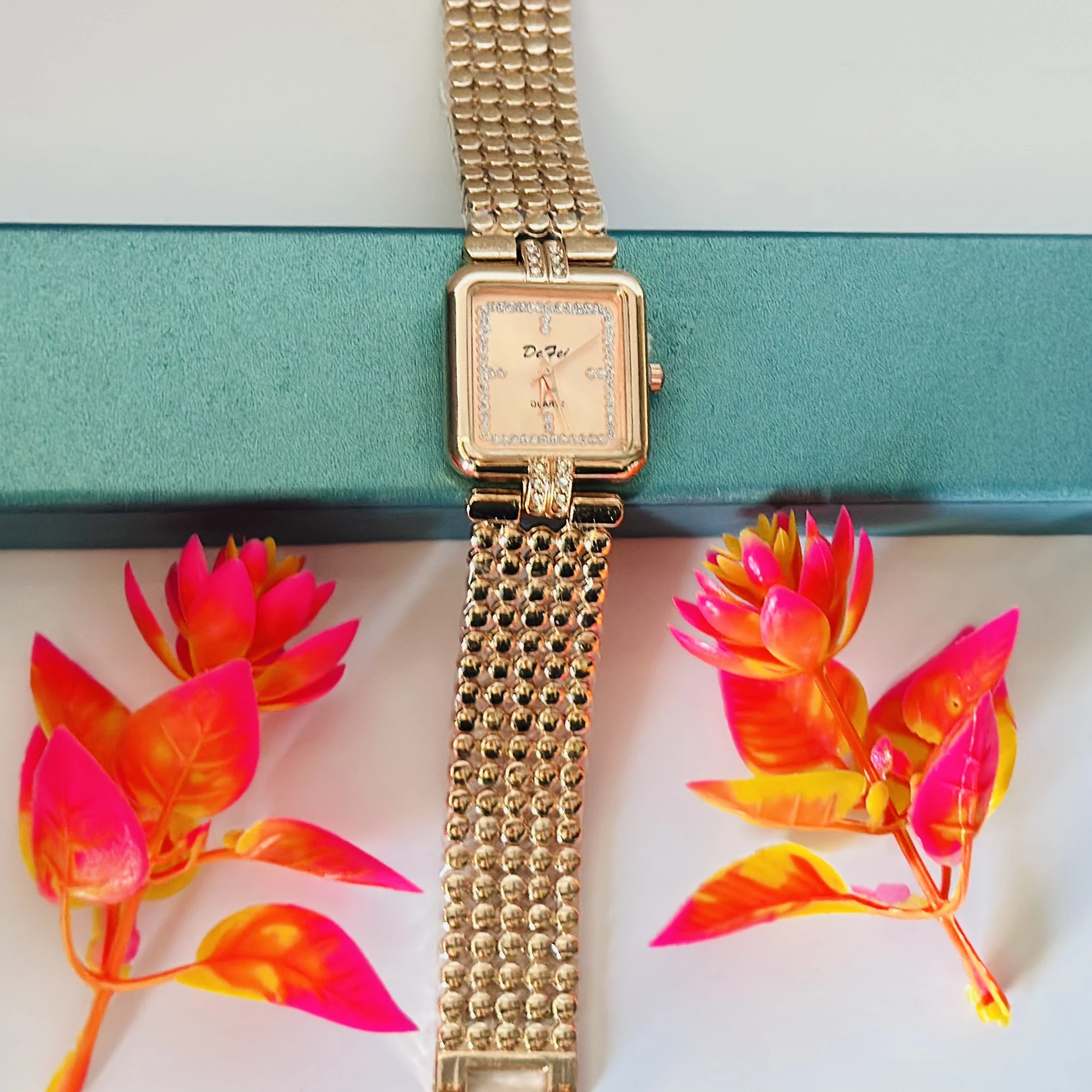 Rose gold analog watch