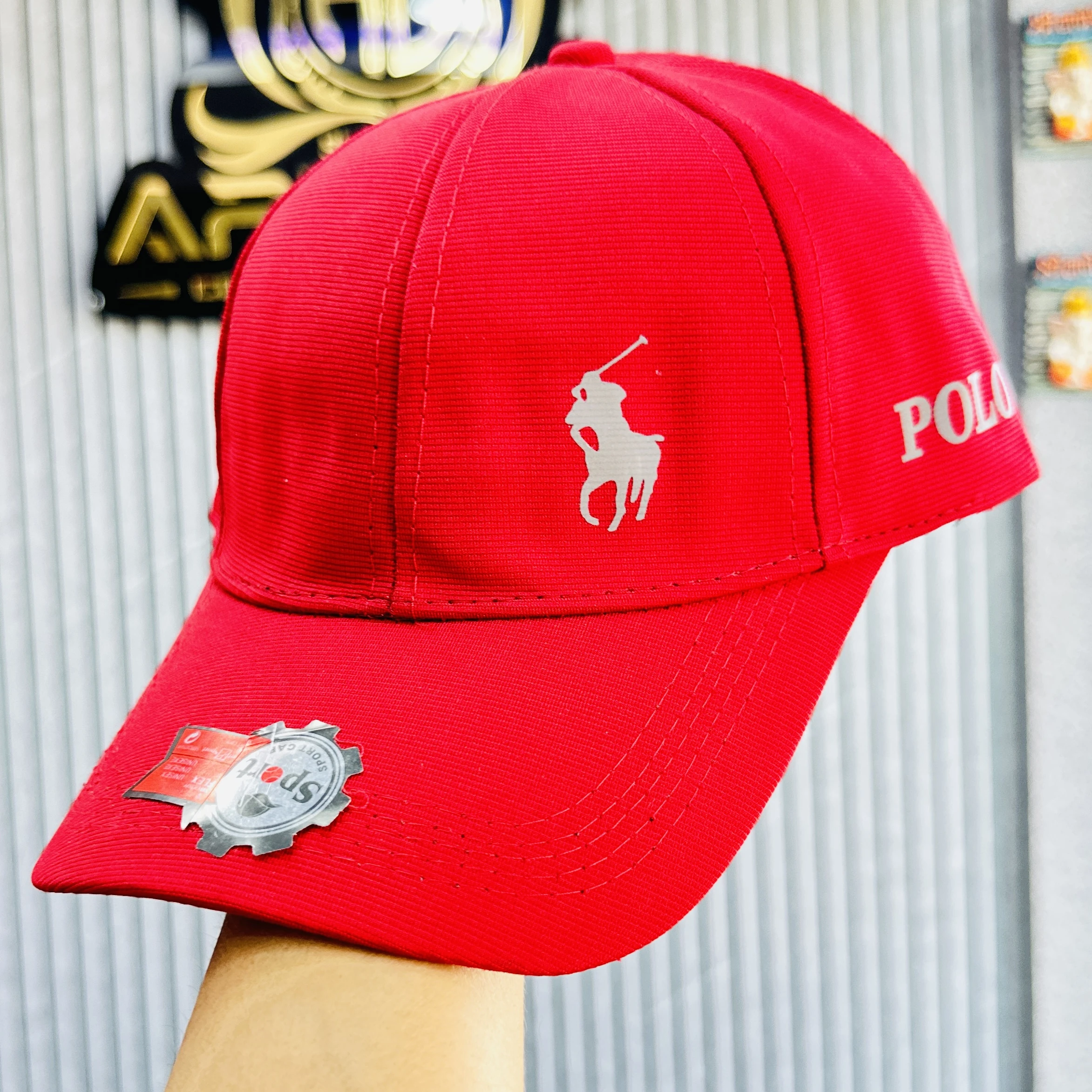 appears to be a red baseball-style cap