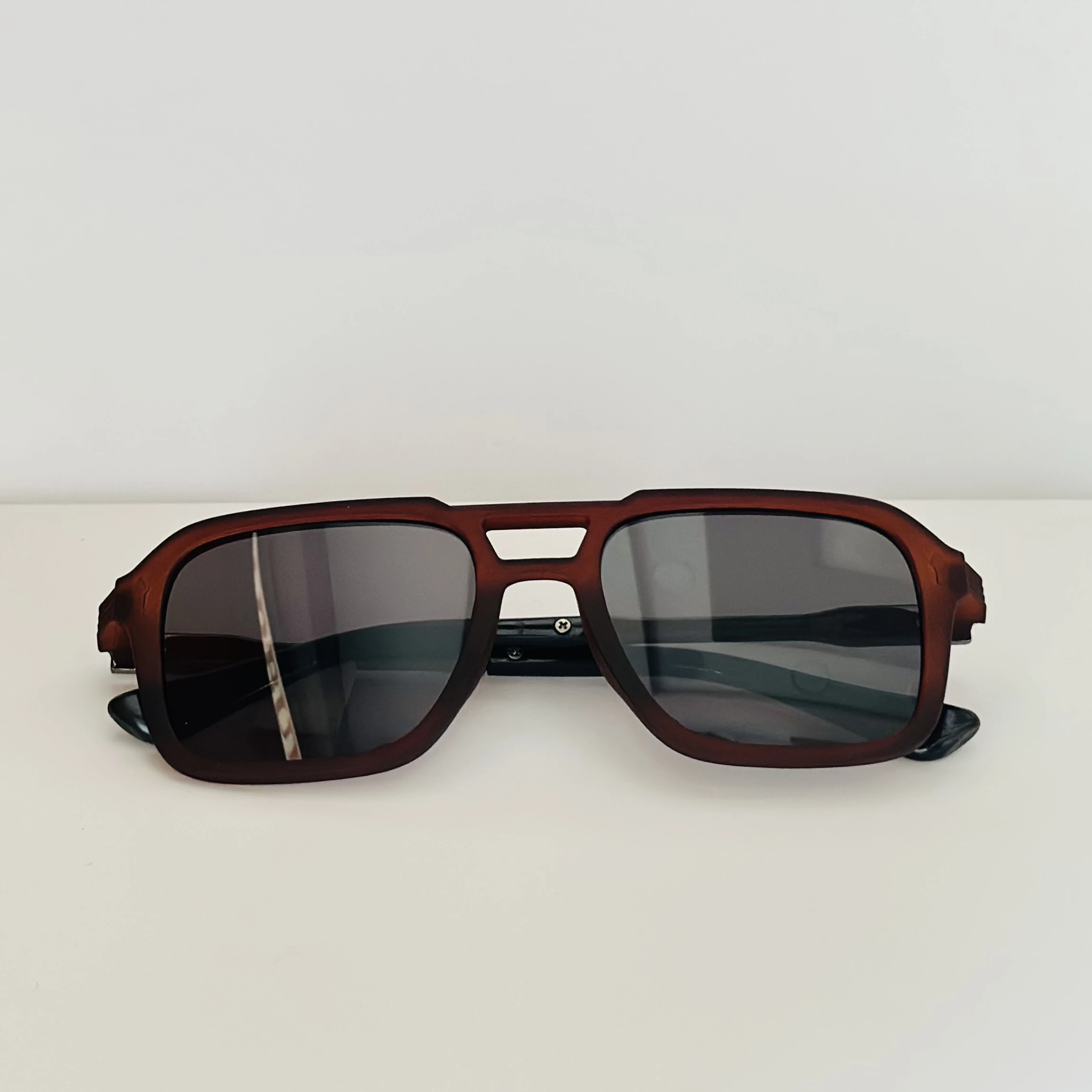 Cutler & Gross 1394 aviator sunglasses in a brown/cherry acetate frame.
