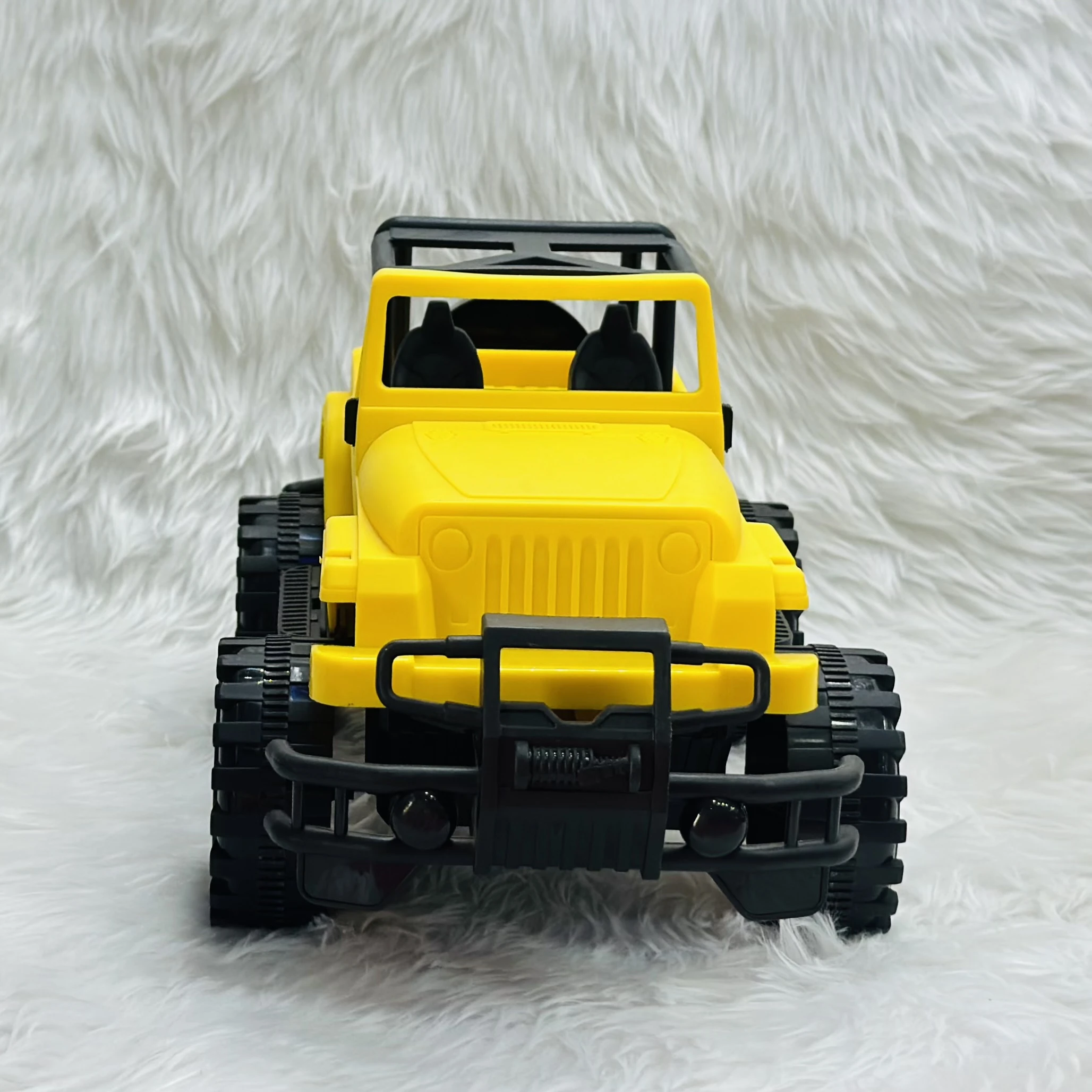 Yellow plastic toy jeep