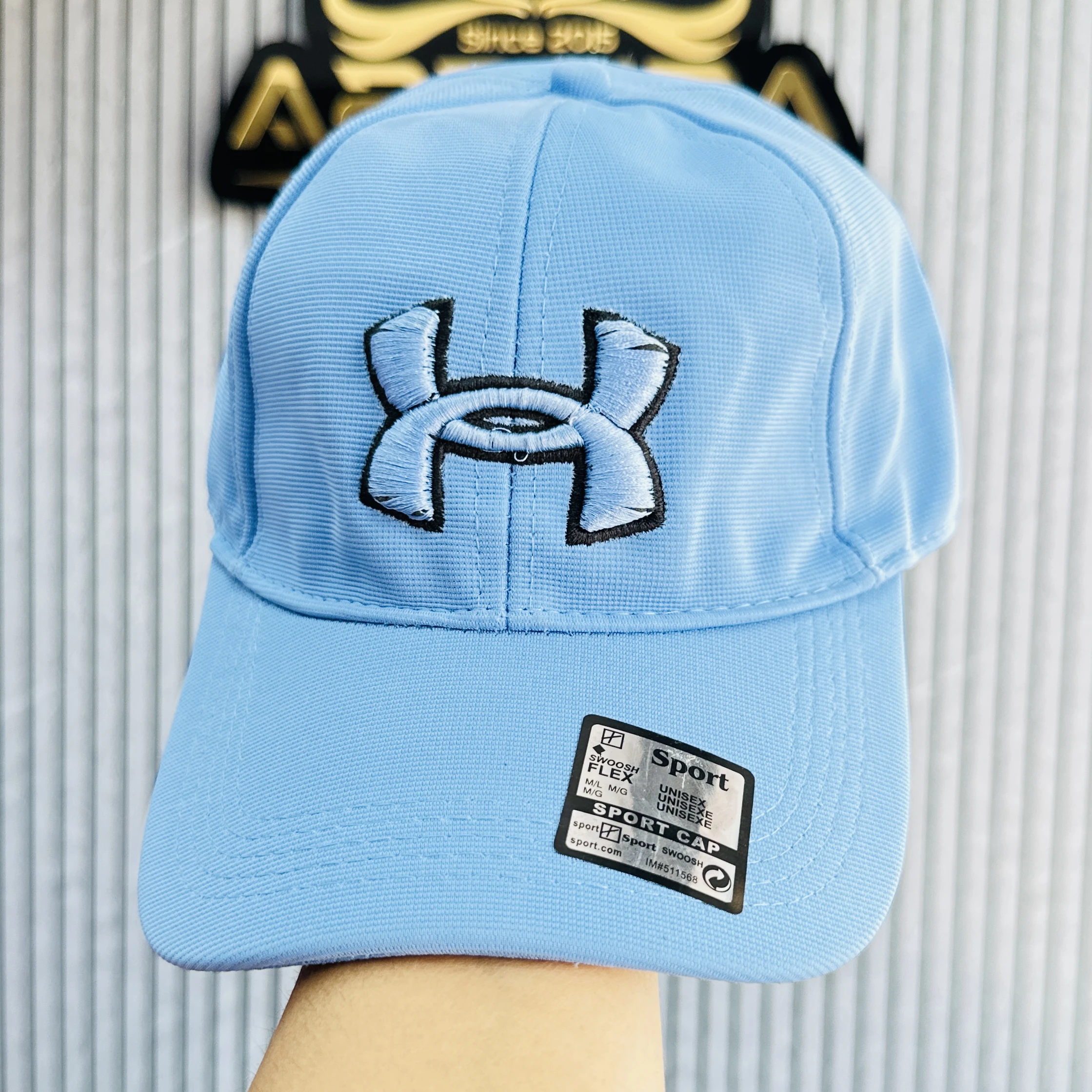 light blue Under Armour Golf96 baseball cap