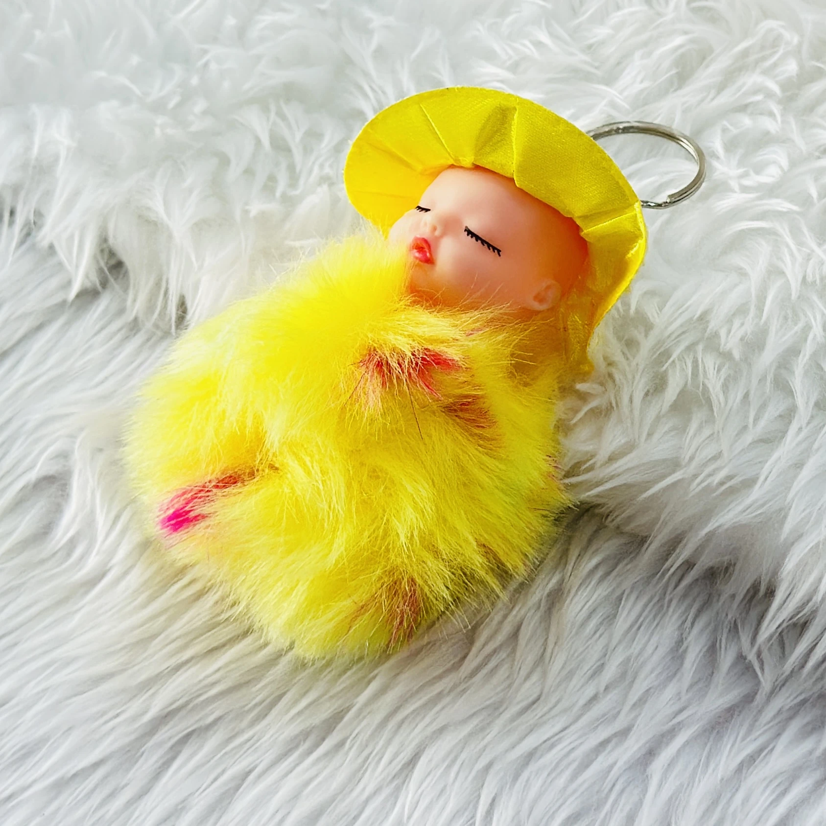 SRG Cute Sleeping Furry Baby doll with cap" keychain