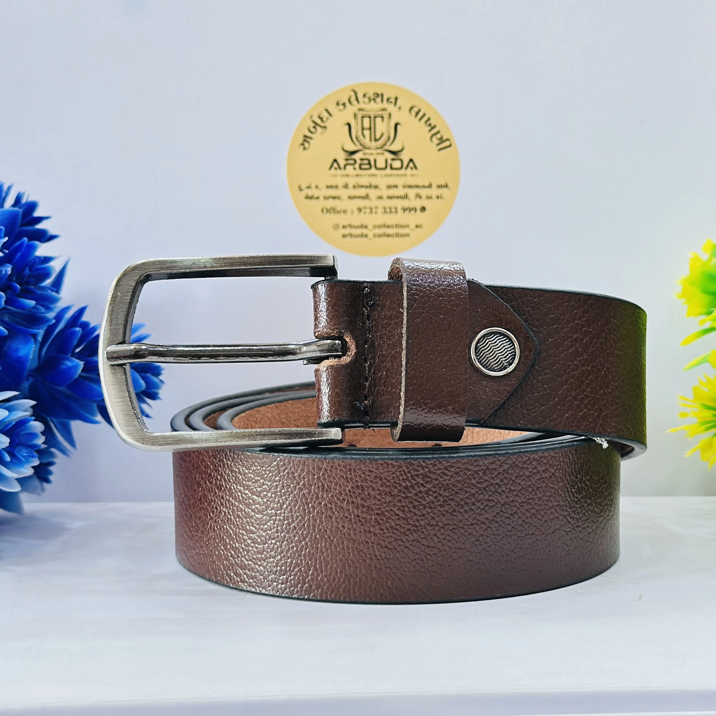 branded belt is a brown, textured men's formal leather