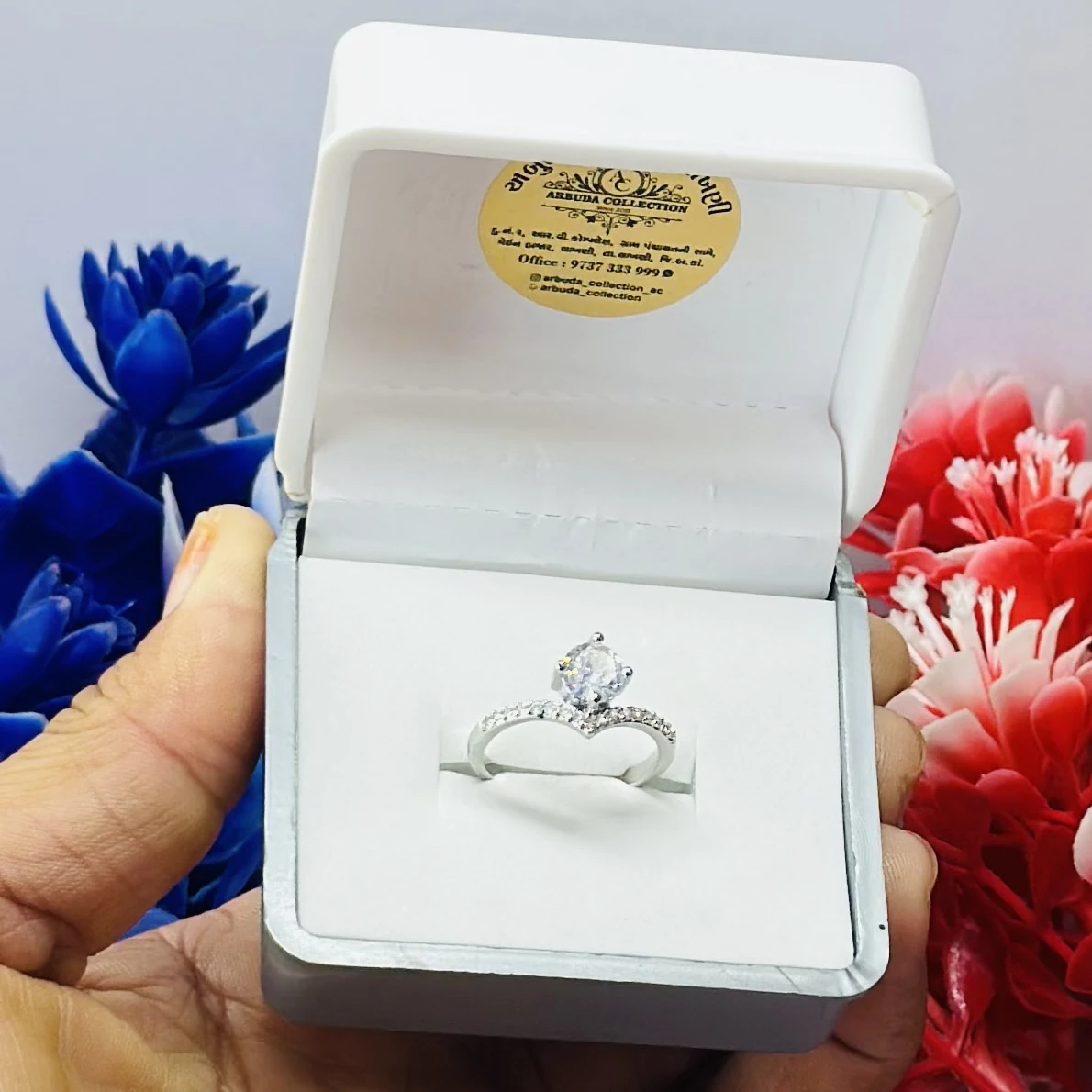 Silver and diamond cluster ring