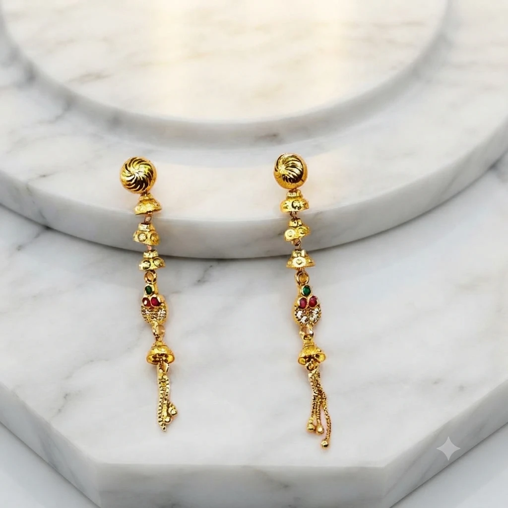 a pair of gold-plated long drop and dangle earrings
