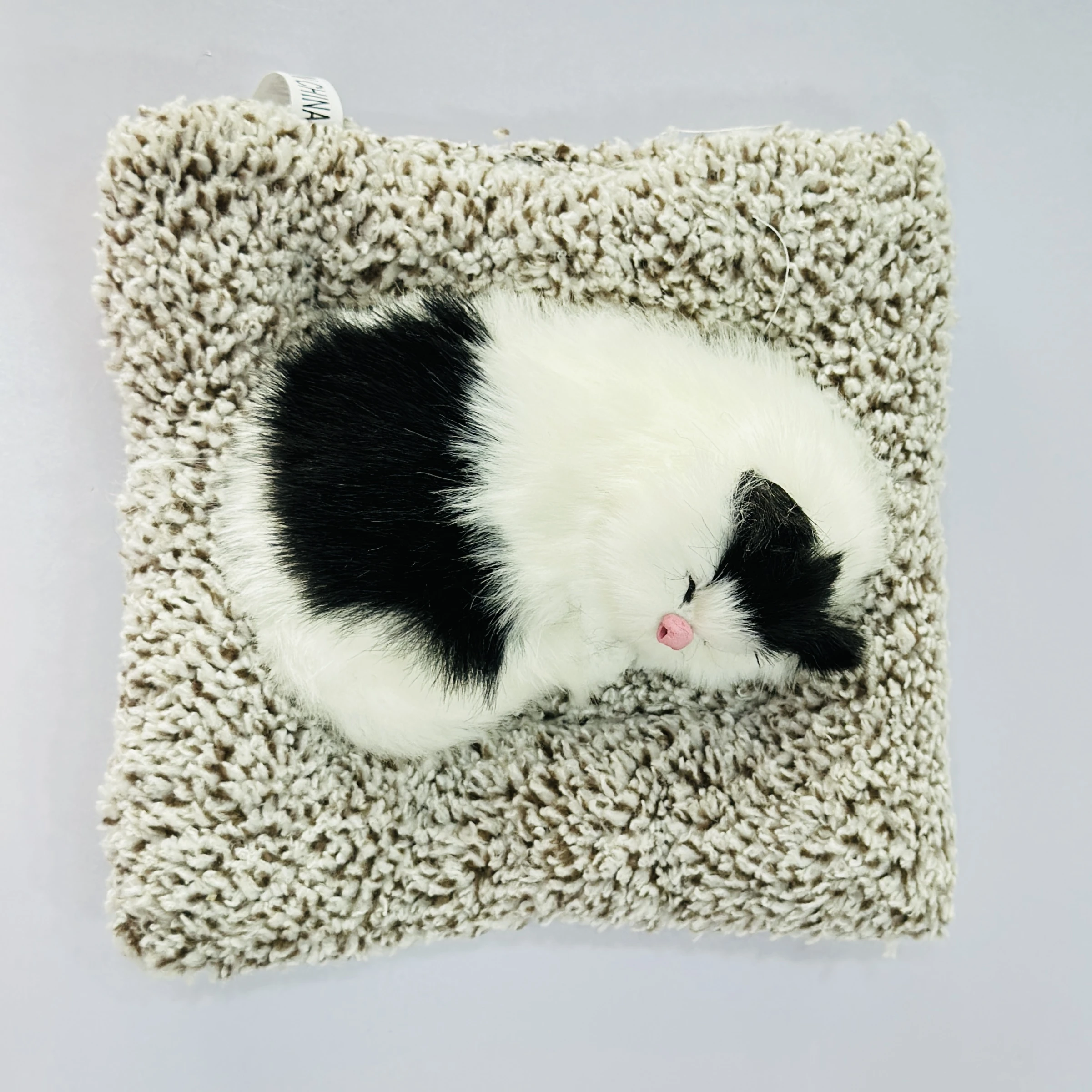 Sleeping cat plush toy