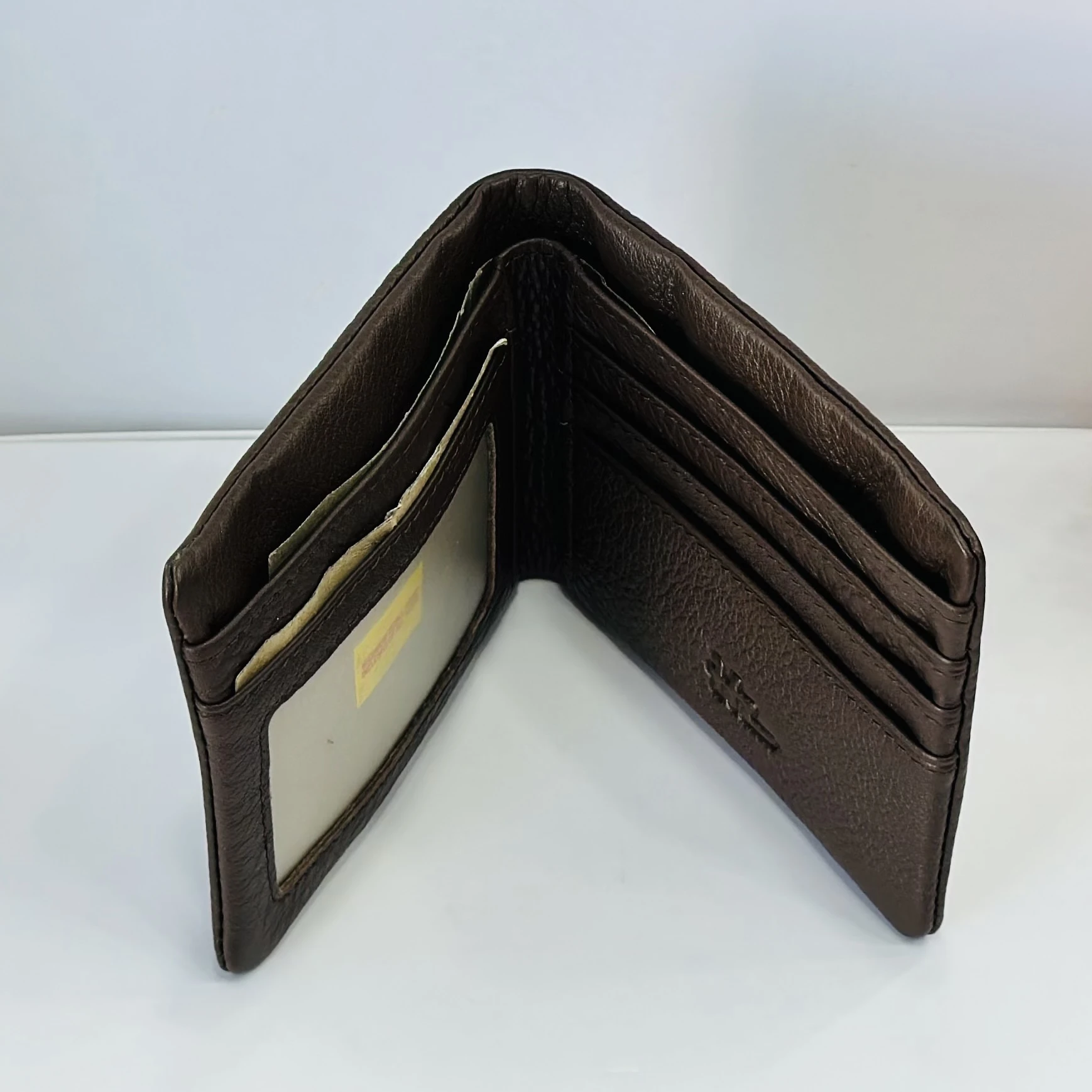 Brown leather bifold men's wallet.