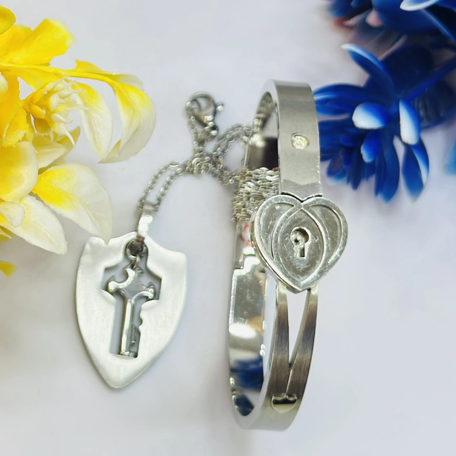 stainless steel lock bracelet and shield key pendant necklace set for couples.