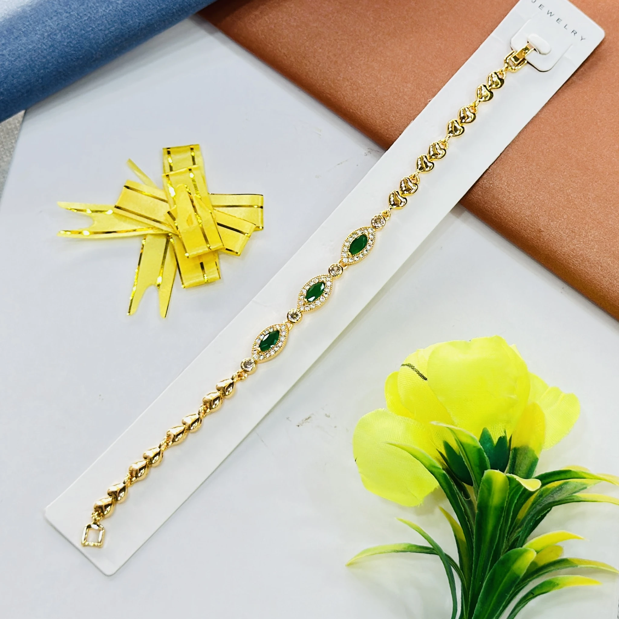 Gold plated, green stone and cubic zirconia embellished bracelet