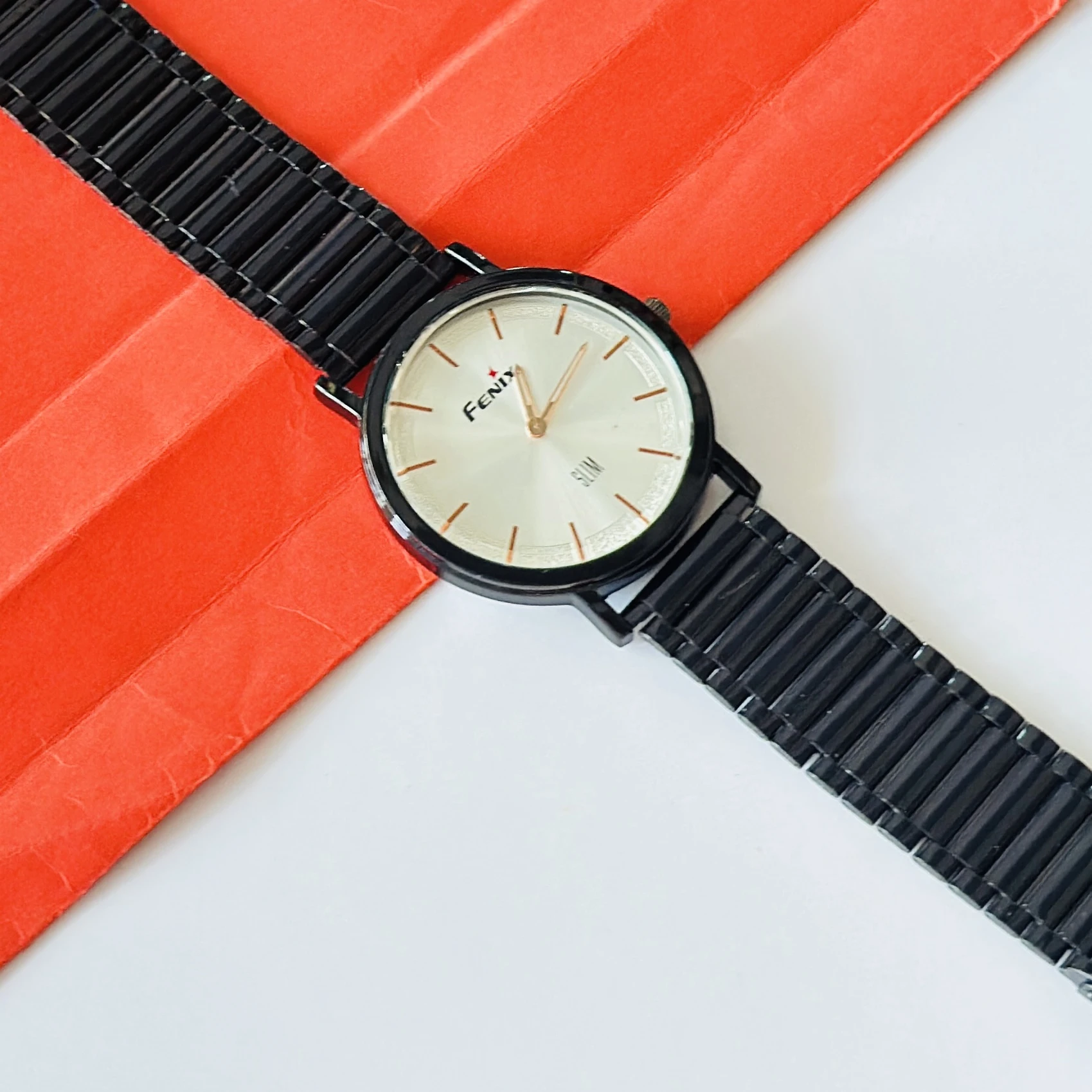 Black analog wristwatch