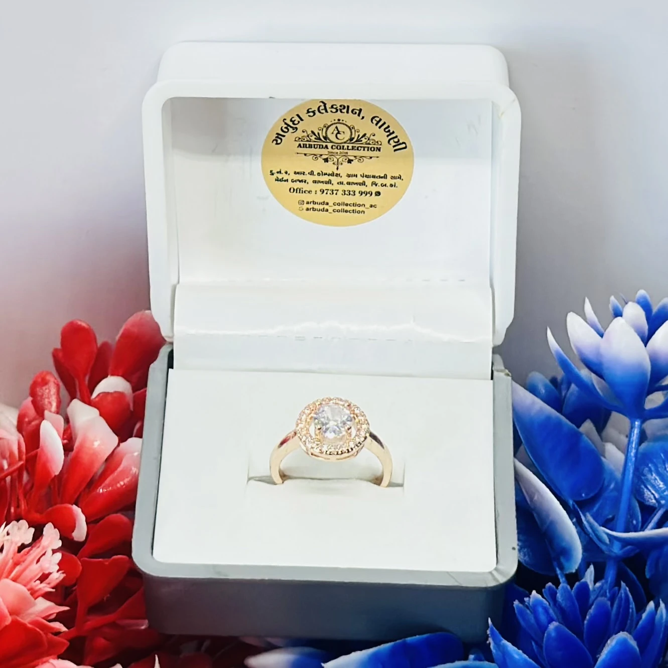 Brass gold-plated CZ stone-studded finger ring.