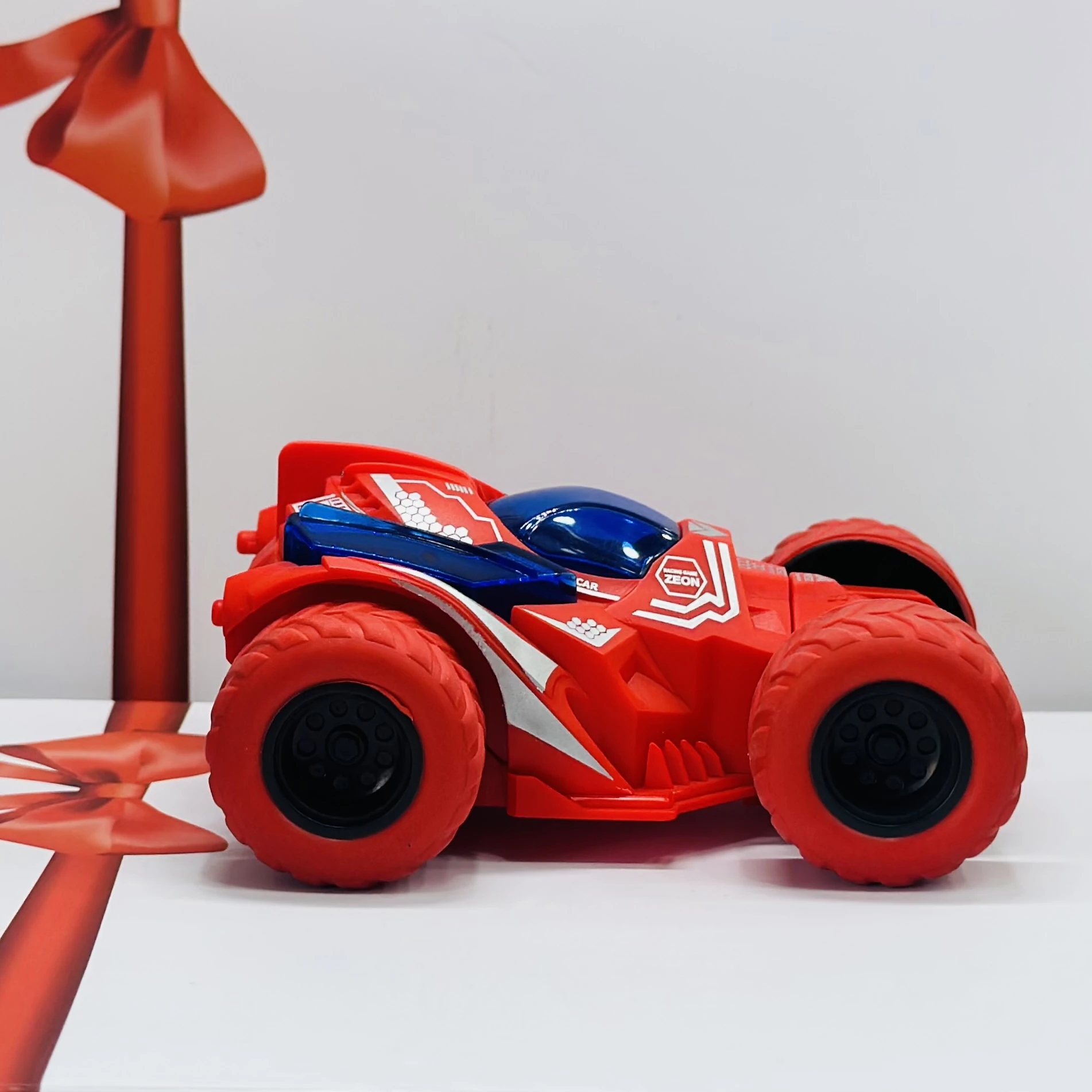 friction-powered toy stunt car