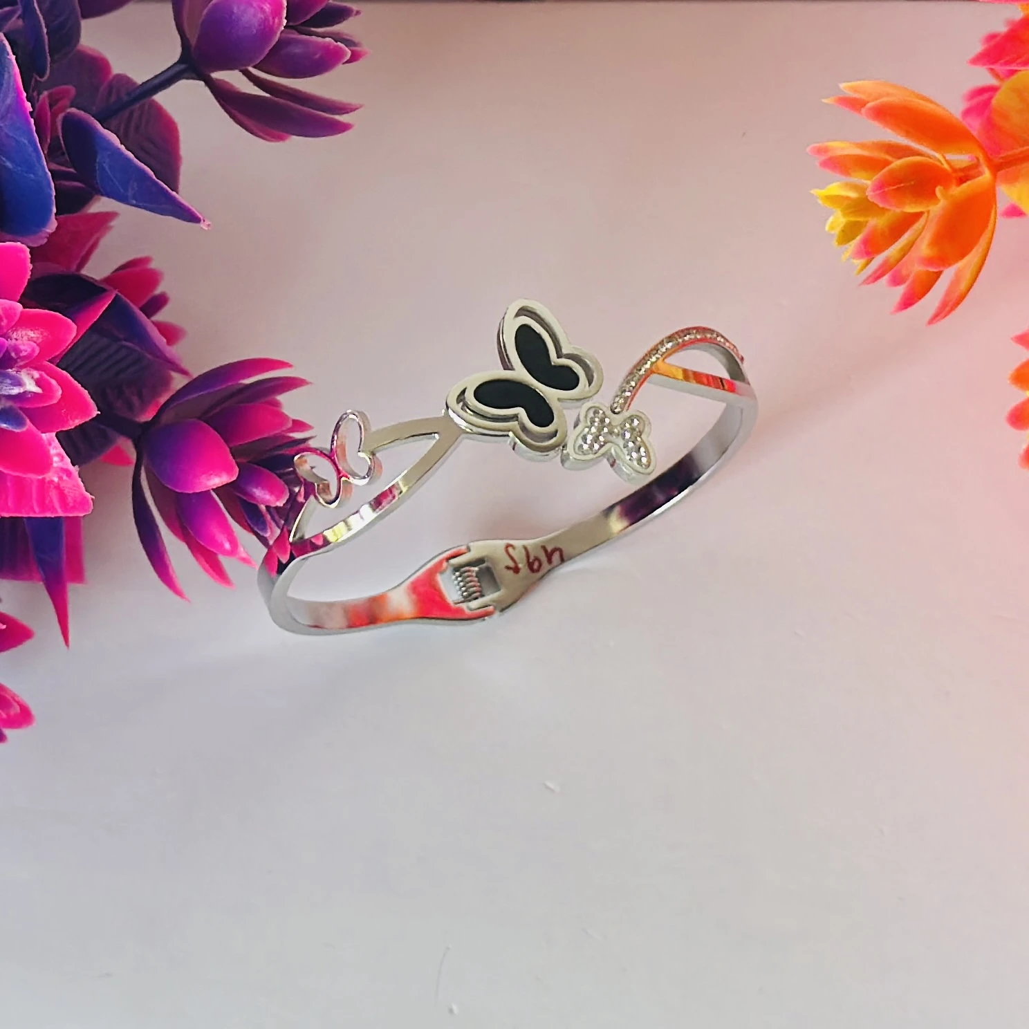 Silver -tone butterfly charm bangle bracelet
