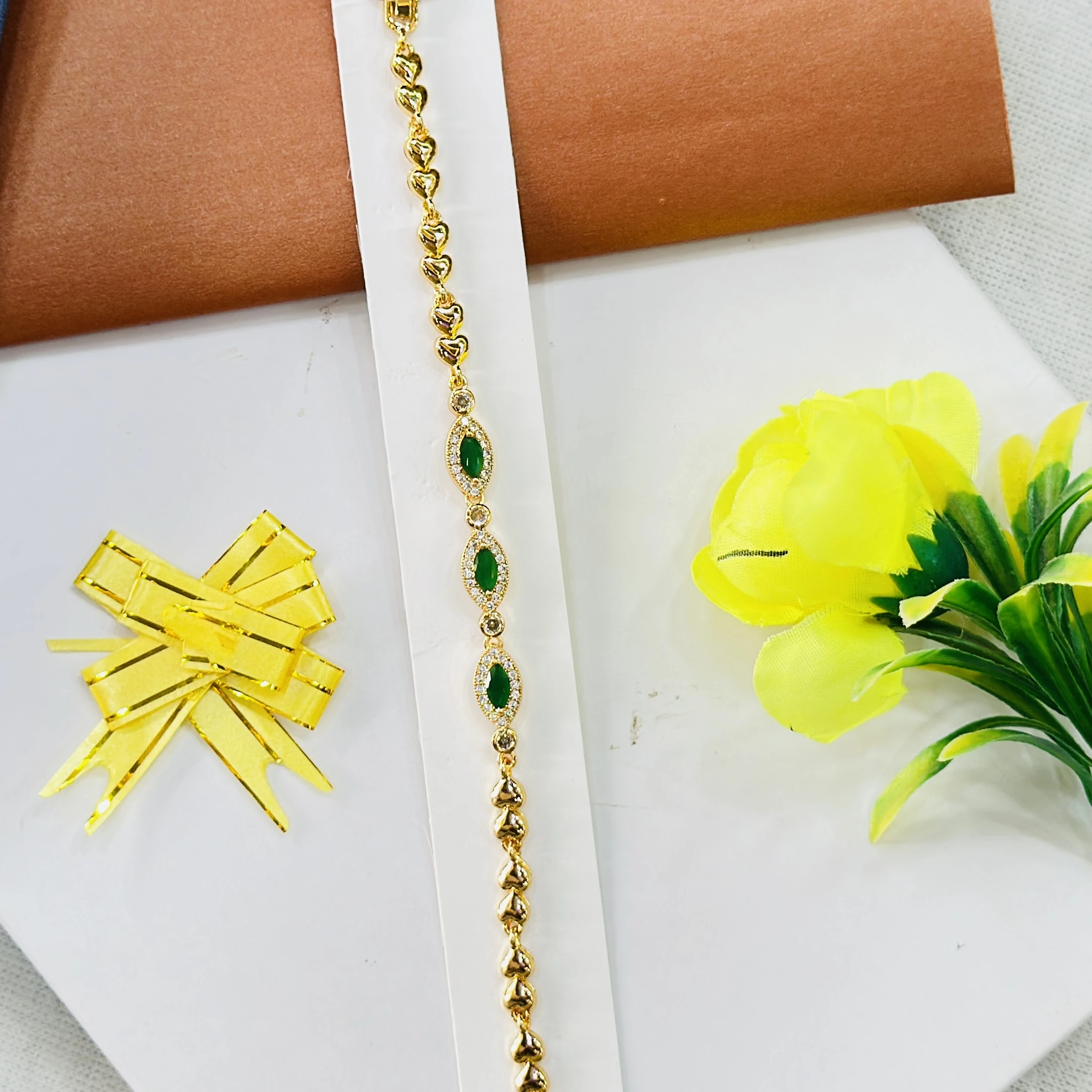 Gold plated, green stone and cubic zirconia embellished bracelet