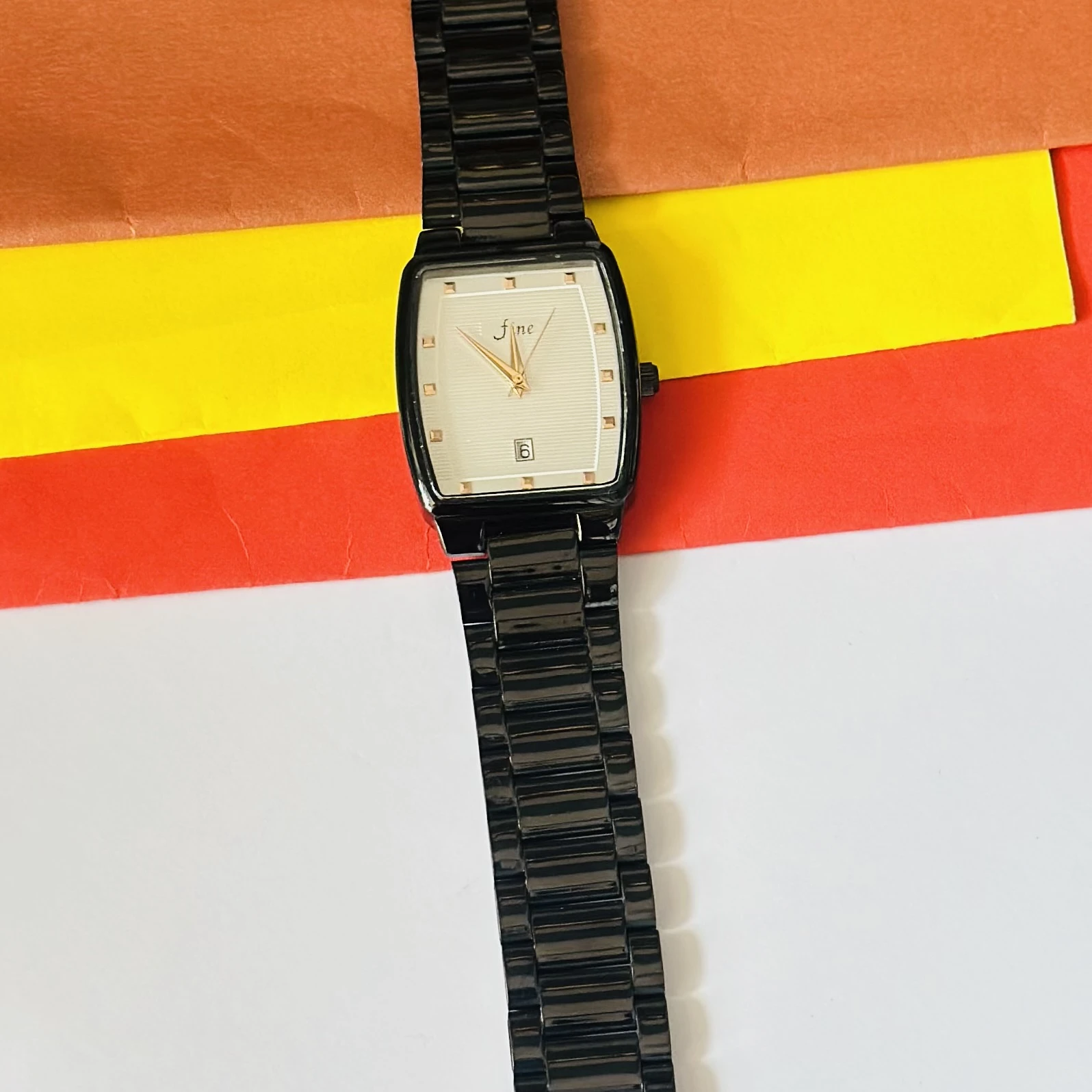 Edge analog watch for men with a rectangular black dial and a black stainless steel strap.