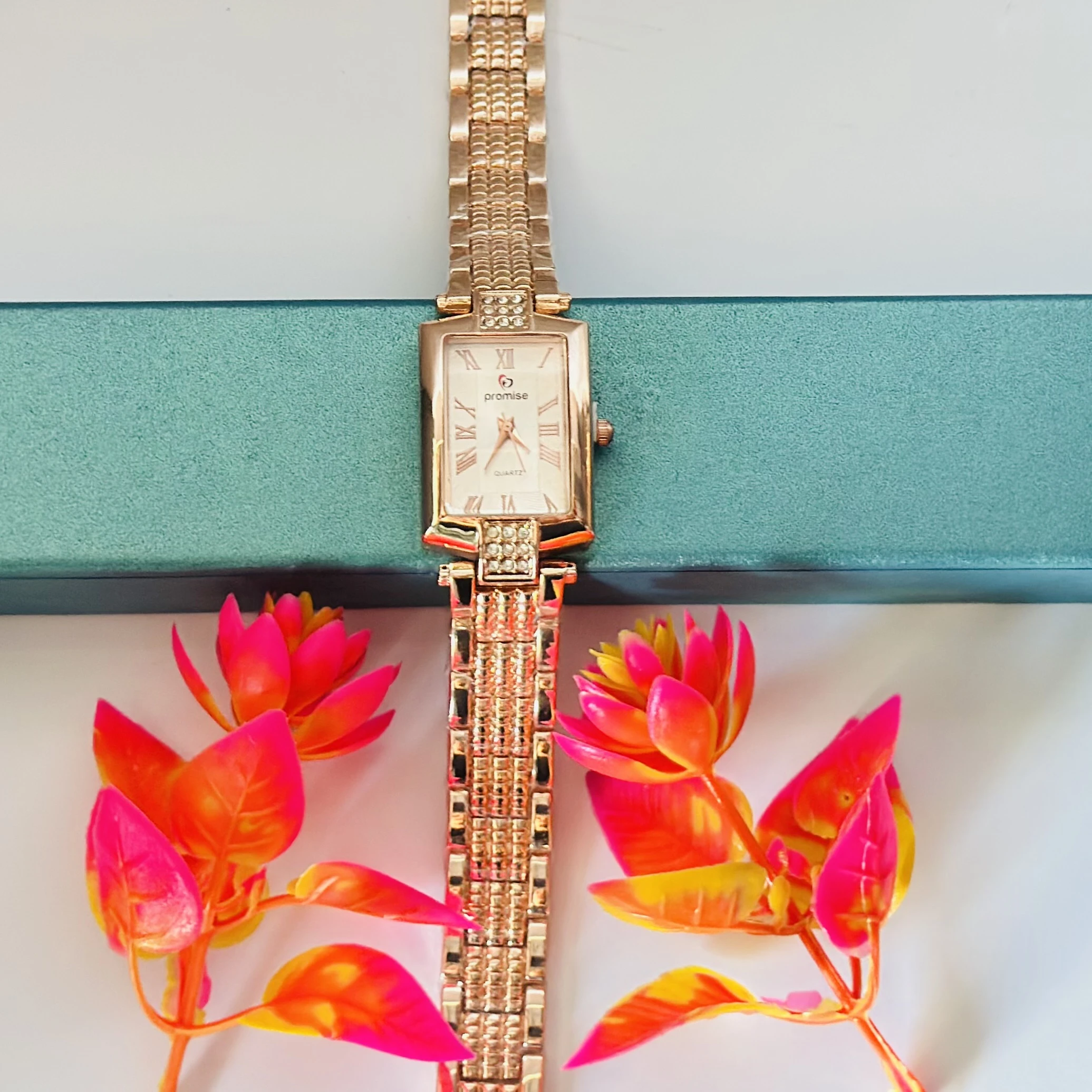 Rose gold analog watch
