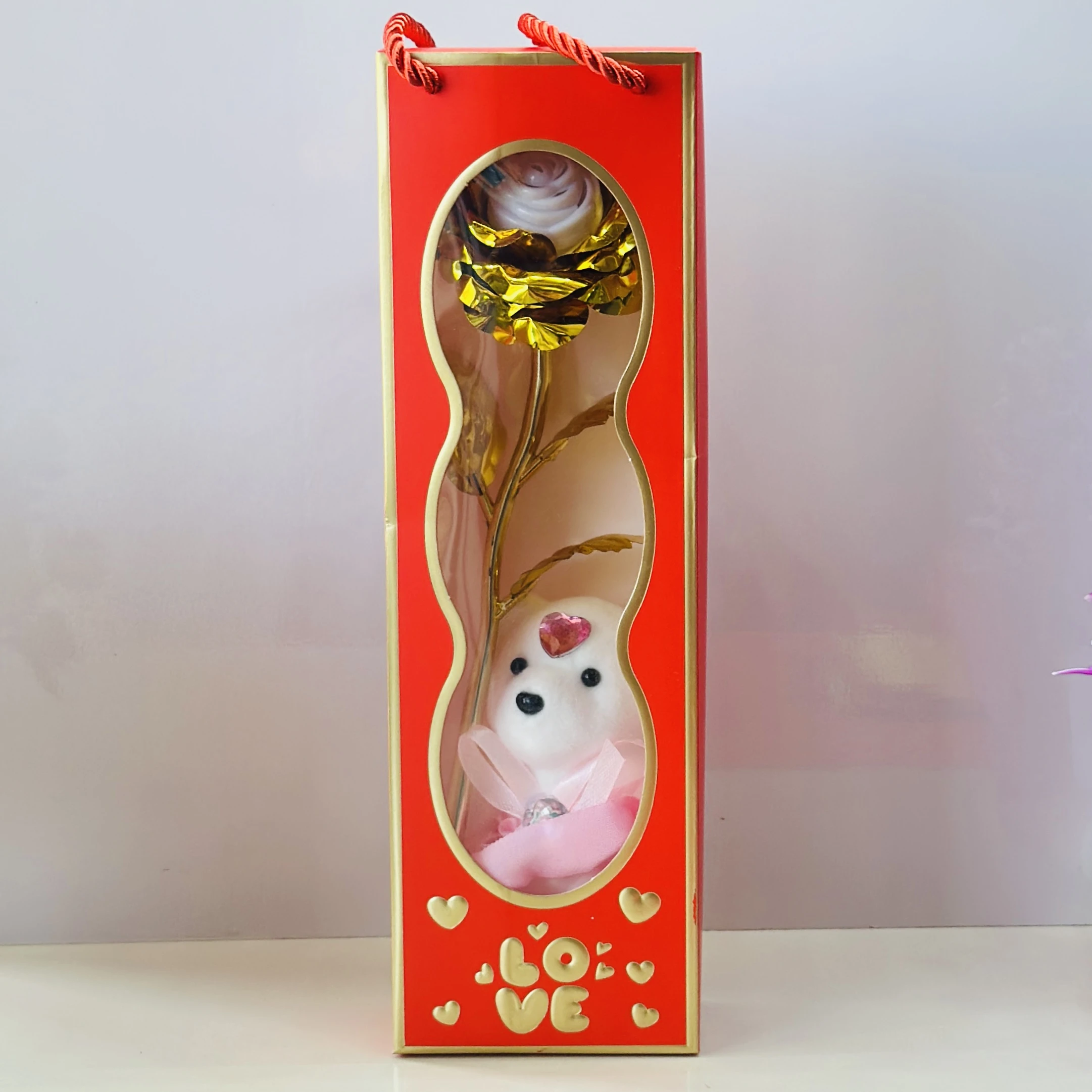 Golden rose and a small teddy bear gift set