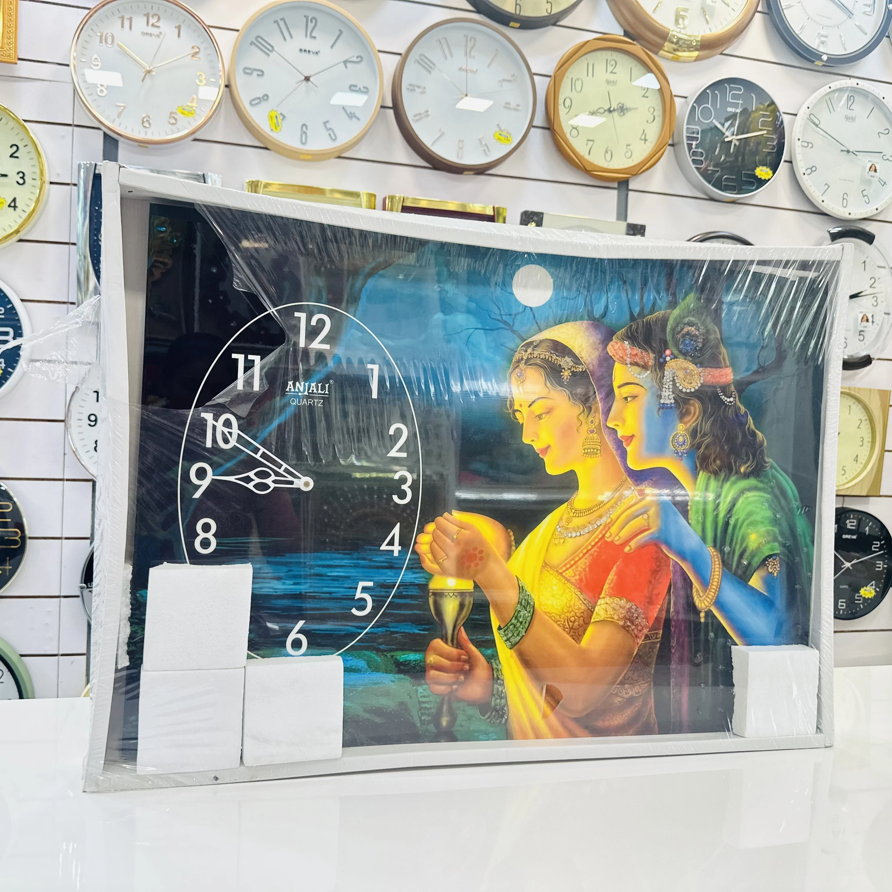 Radhe Krishna-themed wall clock(SKU-3PZG5P)