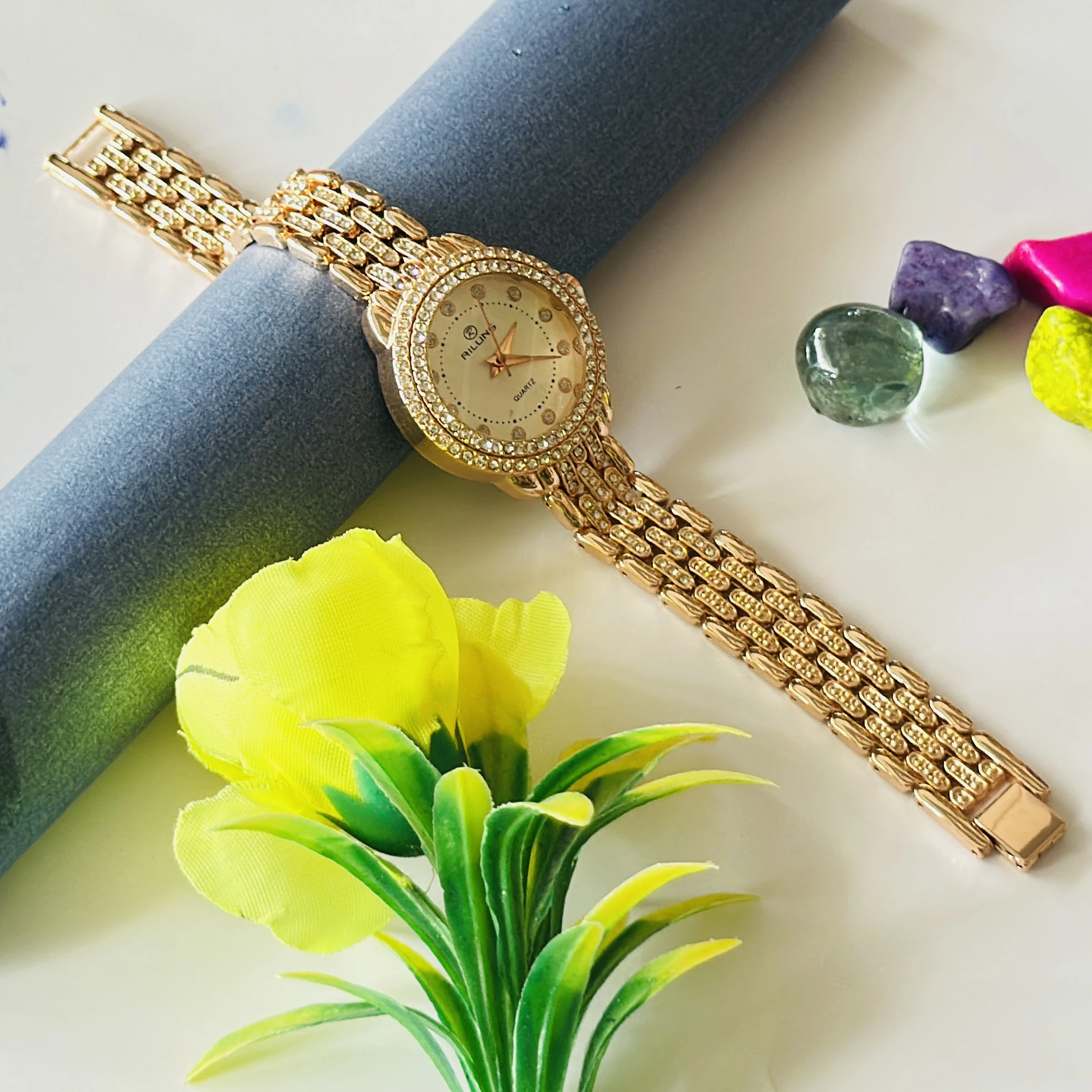 Rillins crystal-embellished gold-tone quartz watch for women.