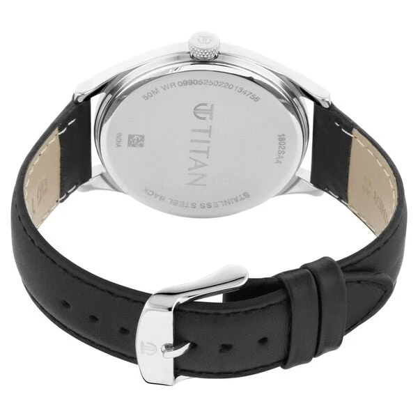 Titan analog wristwatch with a round black dial and a black leather strap