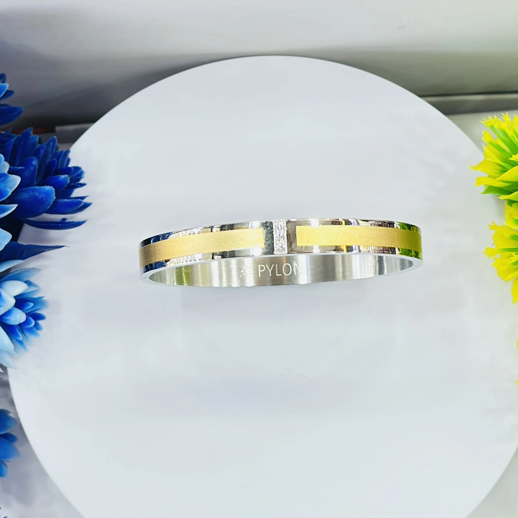 stylish two-tone kada is a stainless steel bracelet